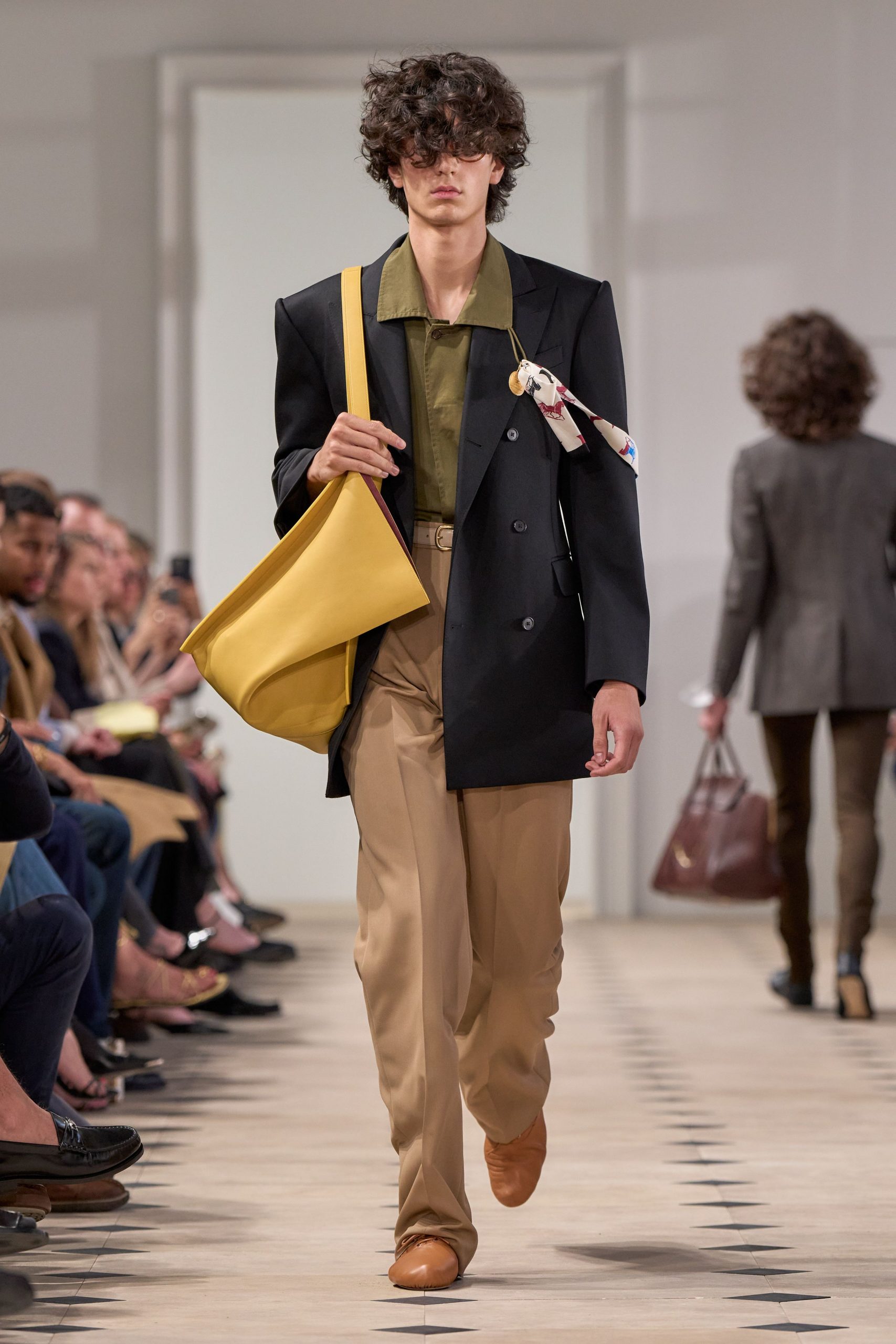 black blazer green shirt beige pants