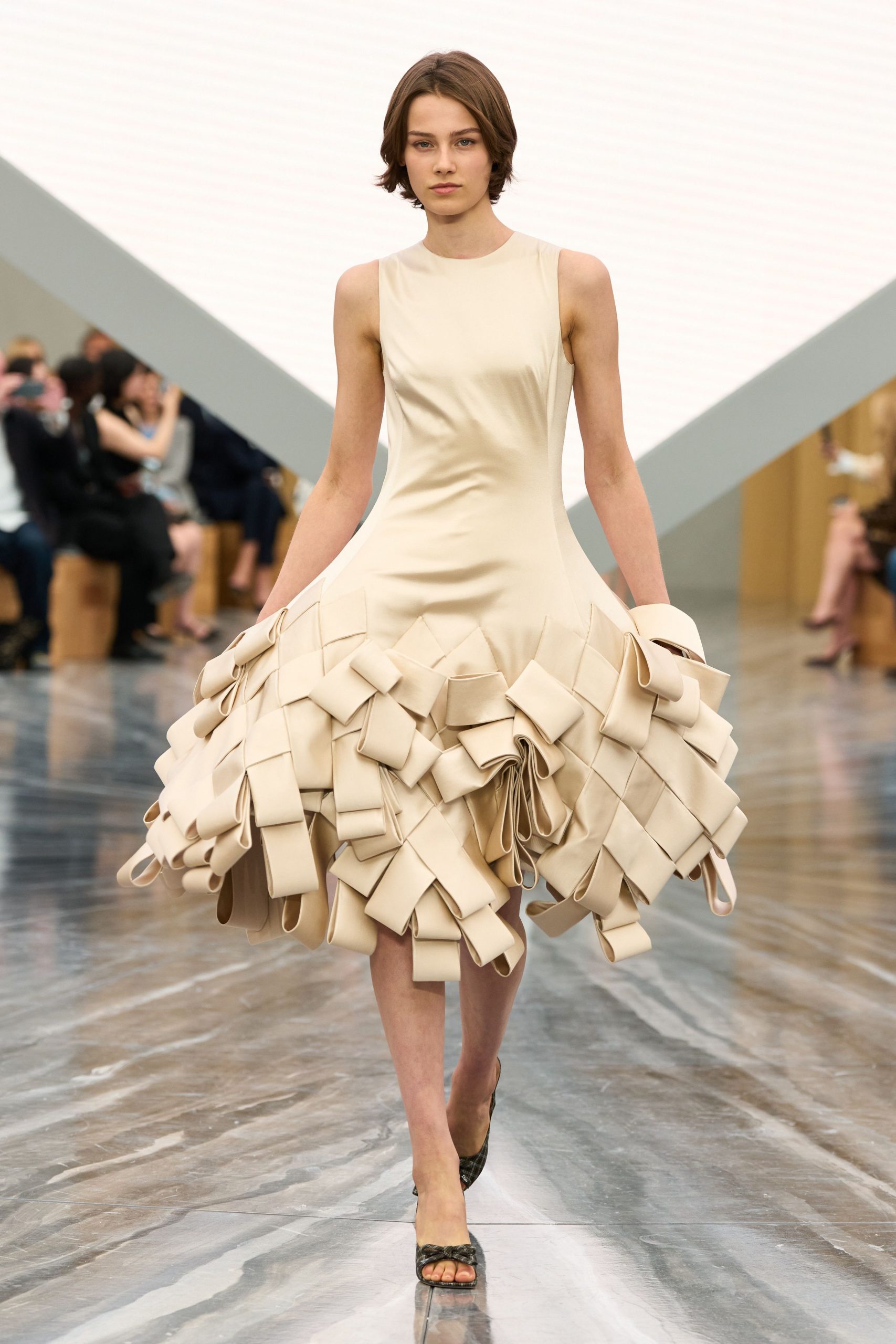 beige pleated midi dress with black shoes