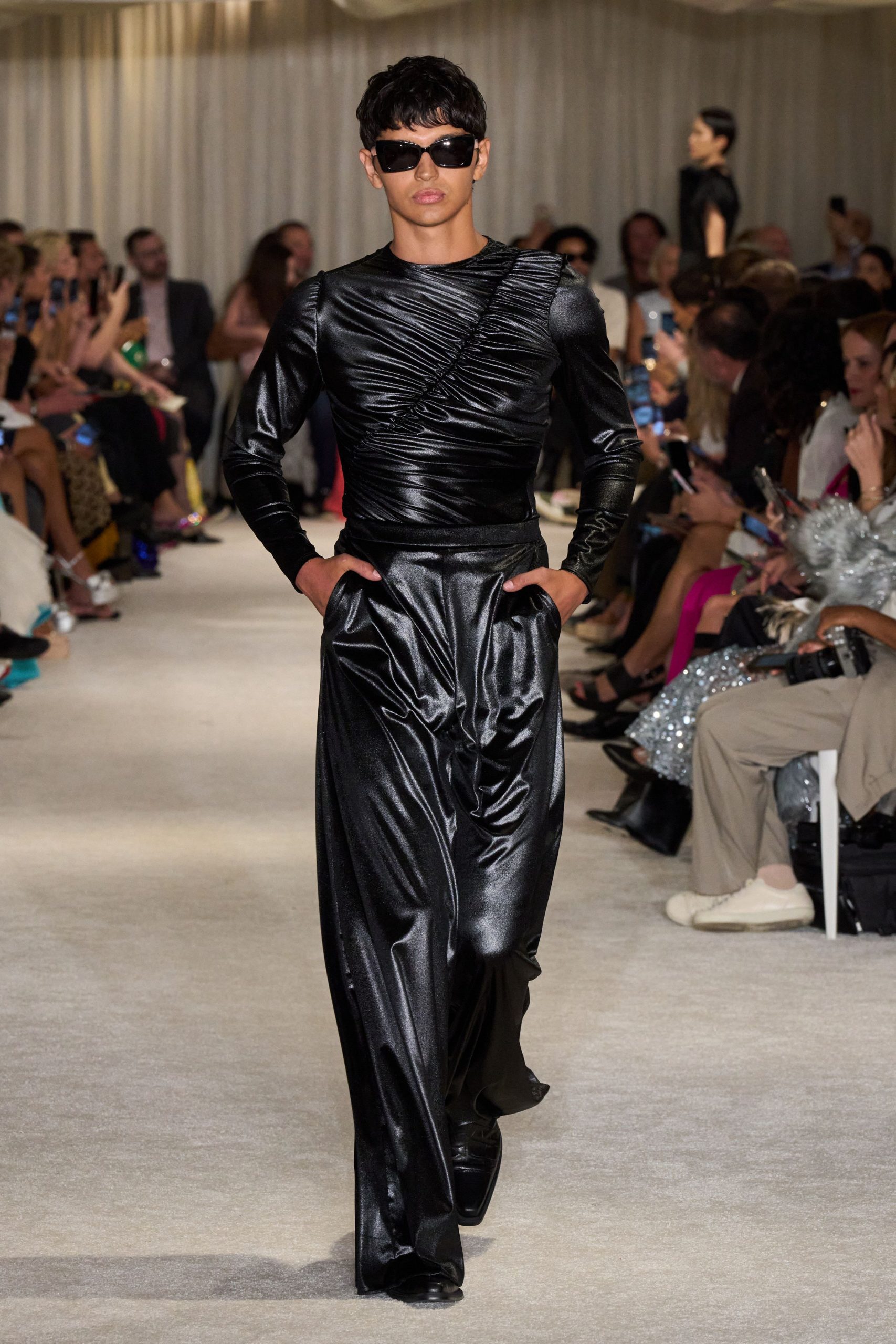 black silk fitted top and relaxed pants