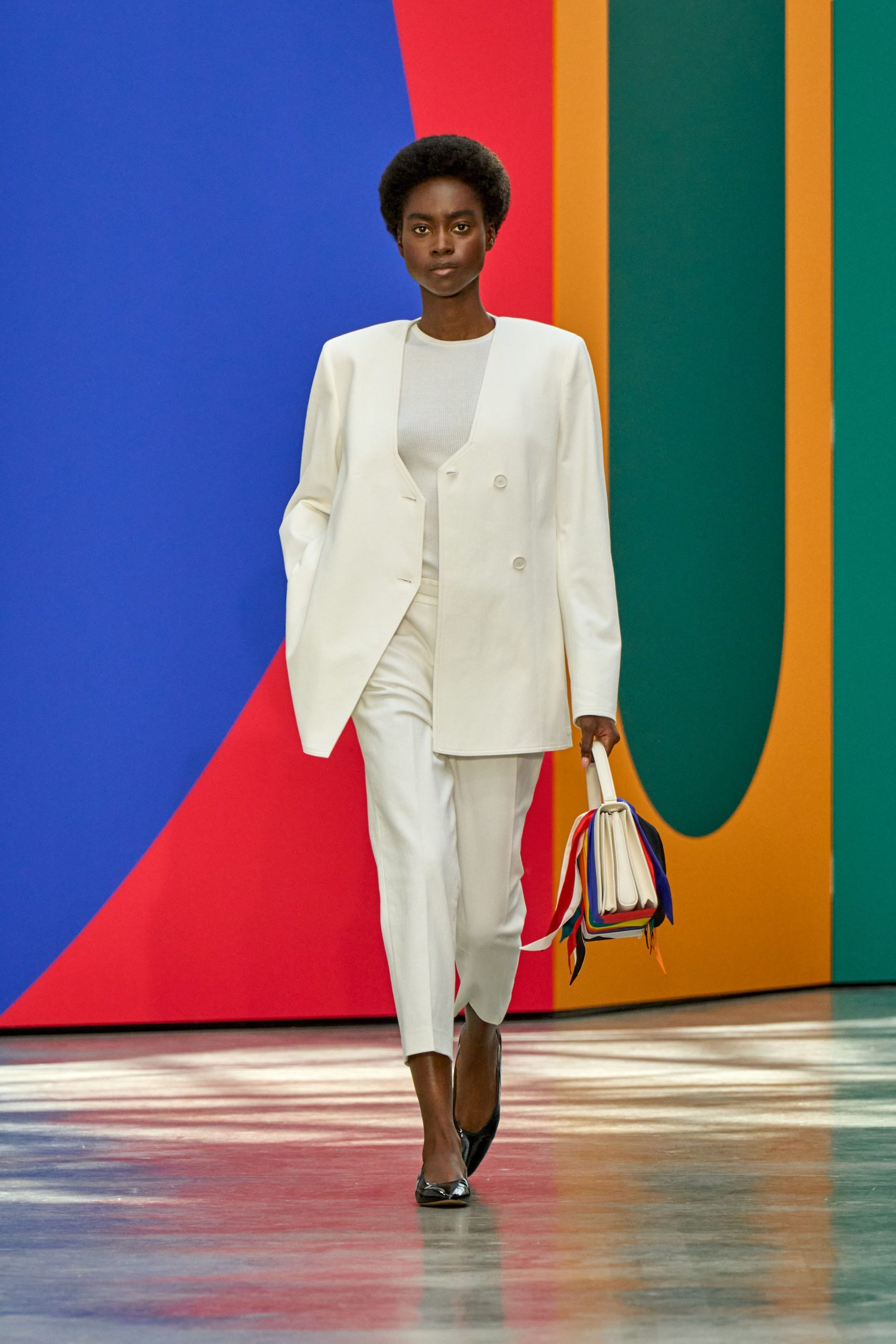 white tailored blazer with slim pants