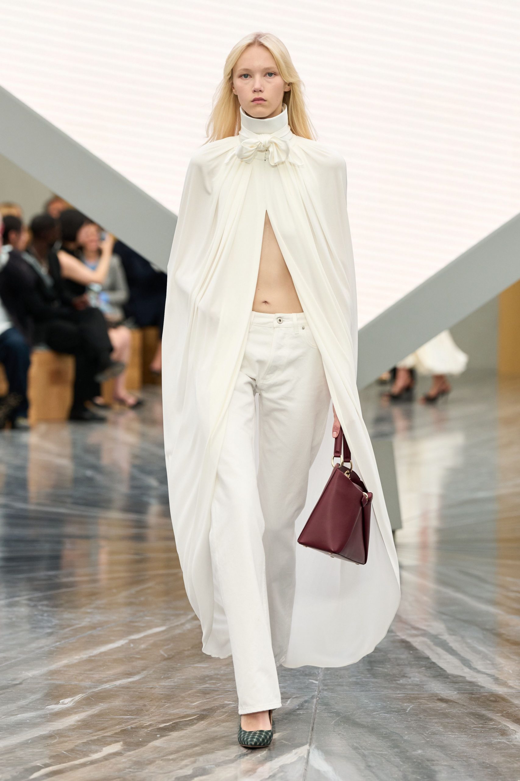 white silk sleeveless high-neck relaxed draped cape