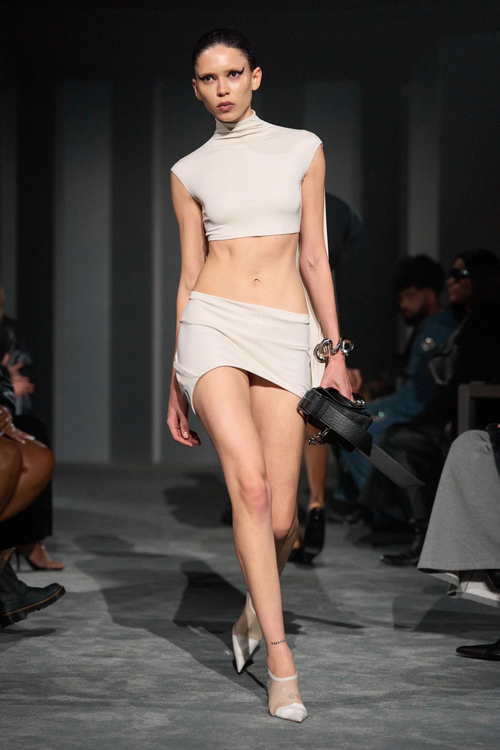 white fitted top and mini skirt