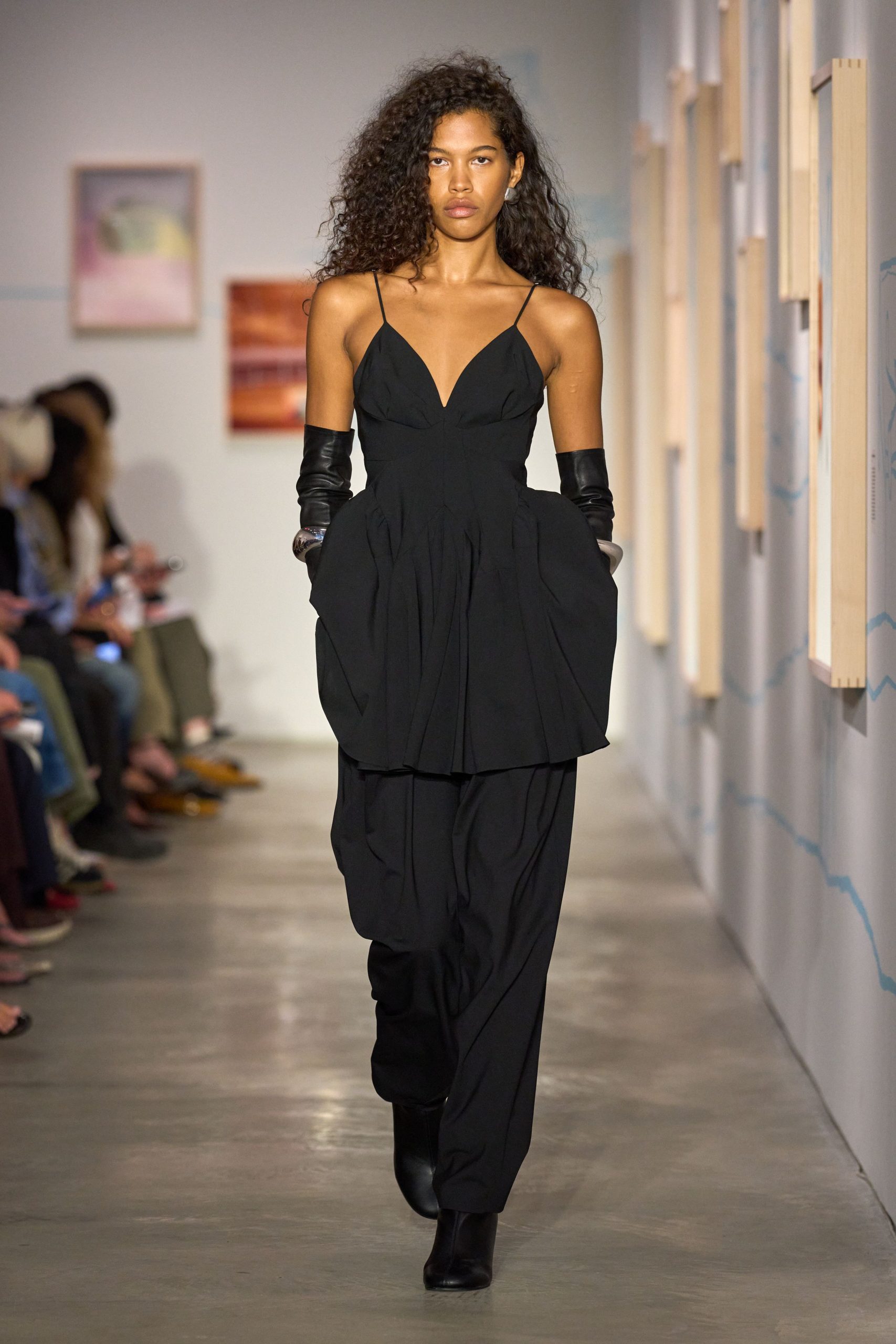 black cotton sleeveless v-neck fitted pleated jumpsuit