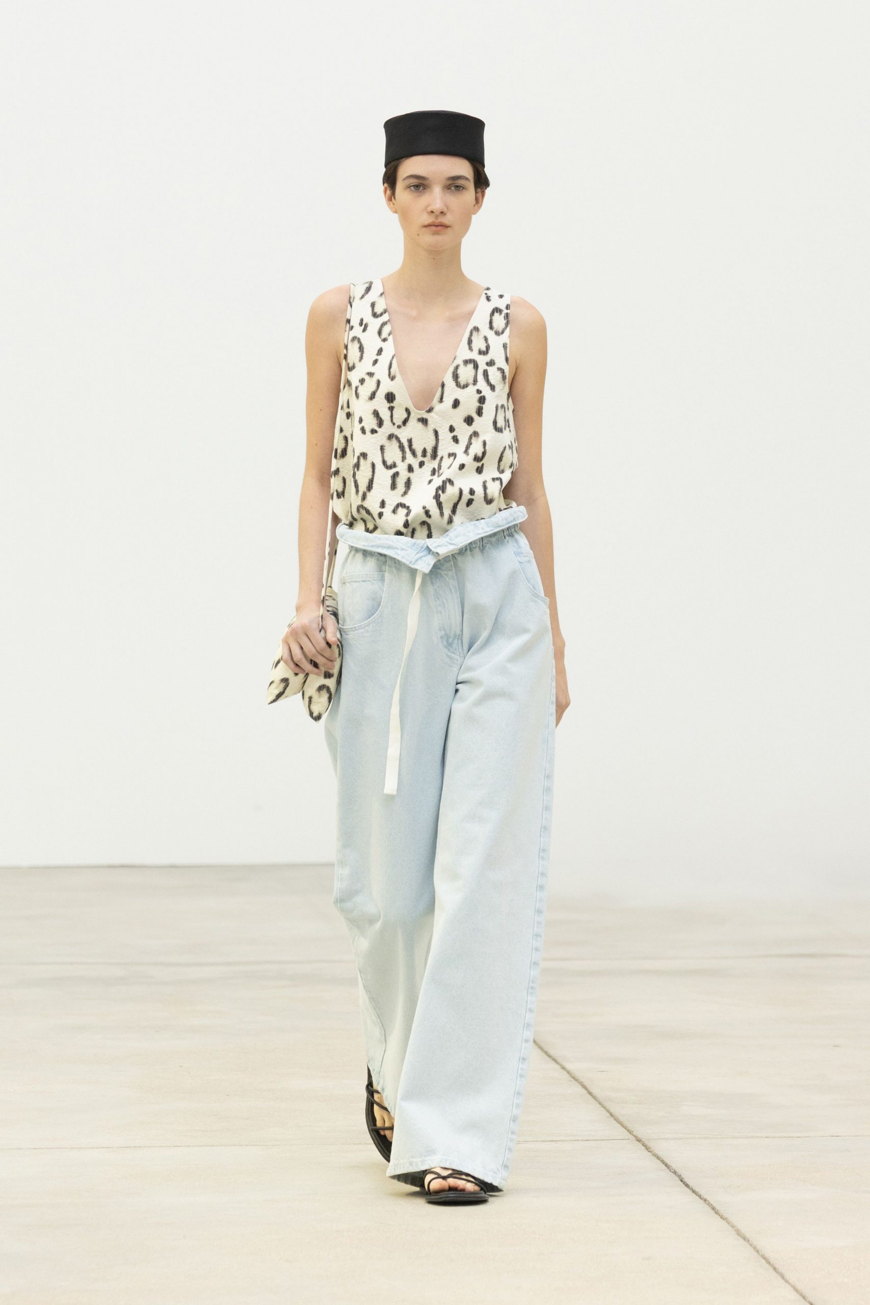 animal-print sleeveless top with wide-leg pants
