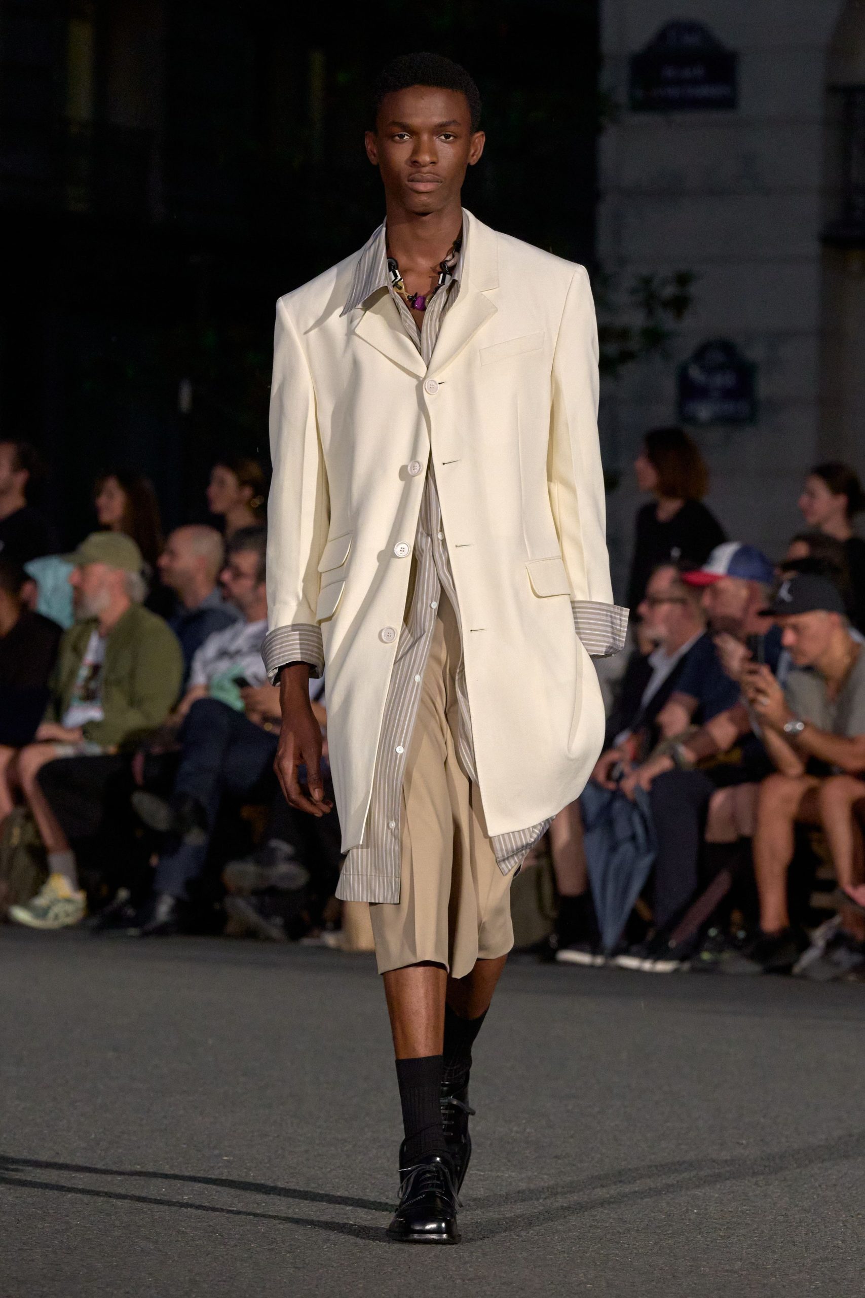 white cotton long-sleeve collared relaxed buttoned coat