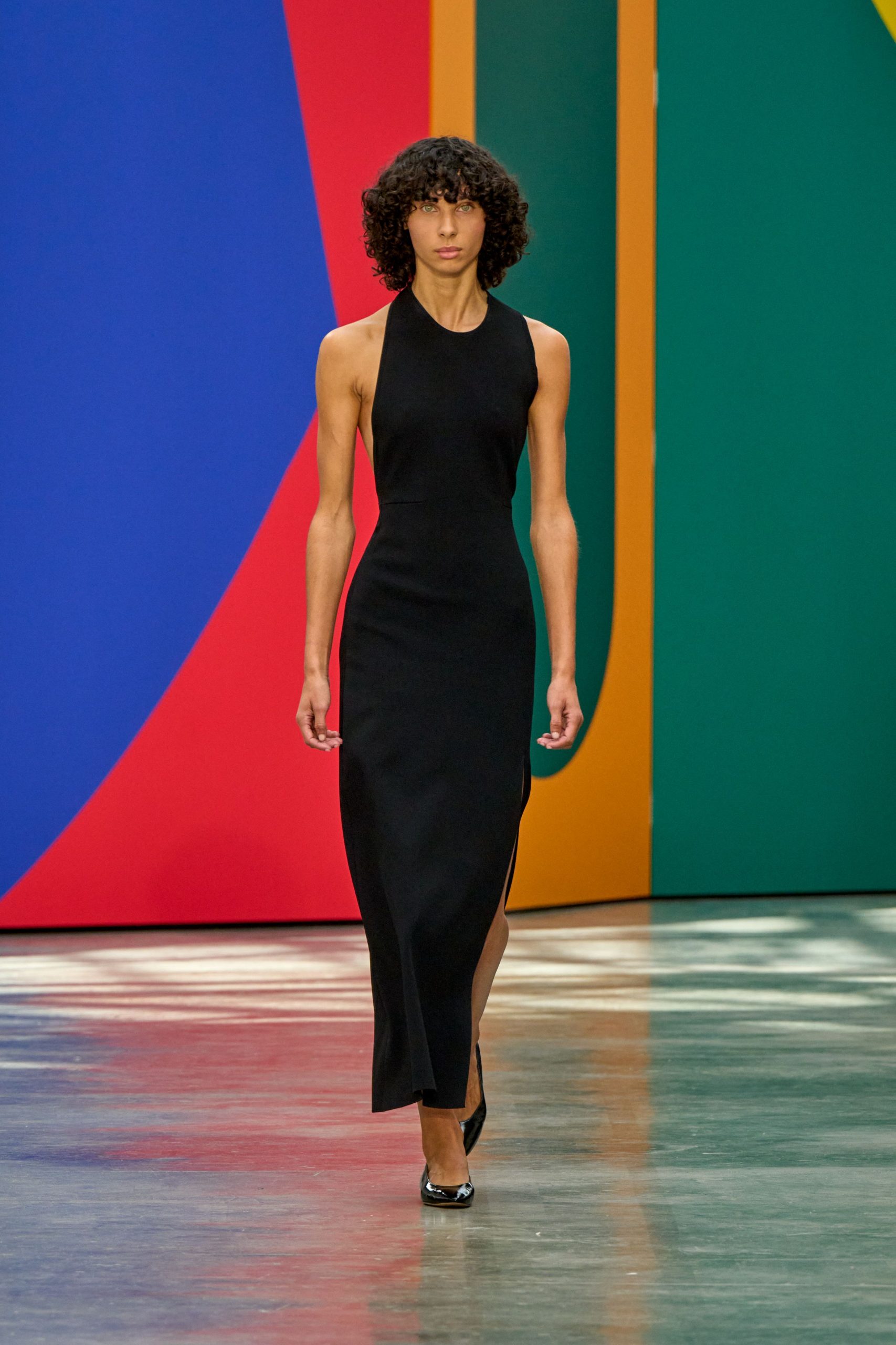 black fitted sleeveless midi dress