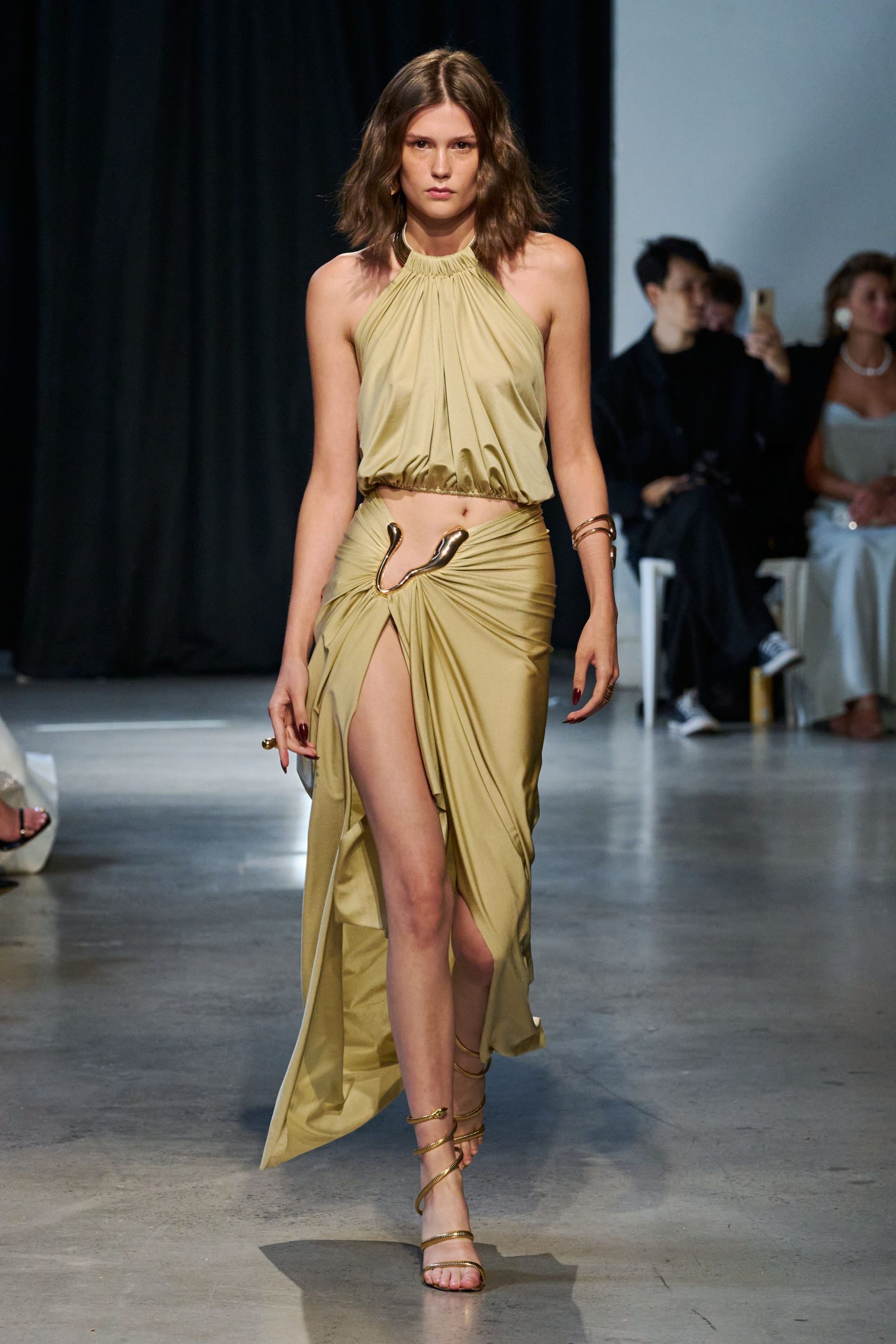 green silk sleeveless high-neck fitted draped flowing dress