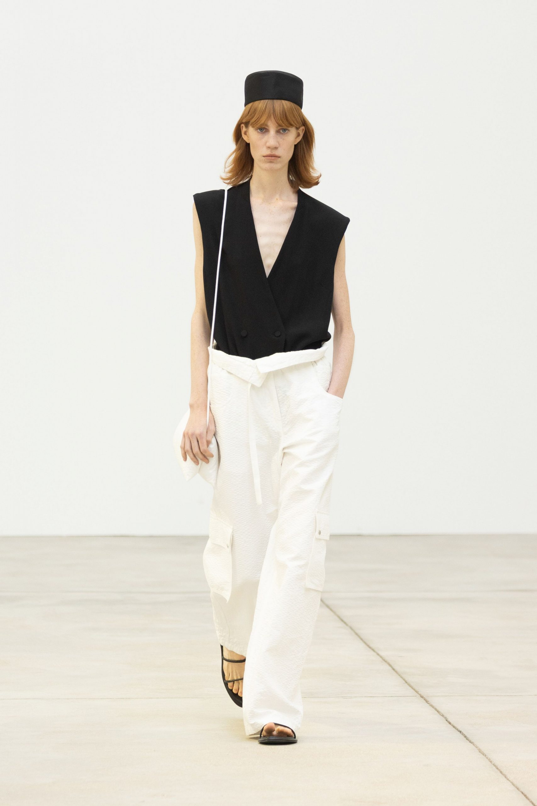 black cotton sleeveless v-neck fitted buttoned top