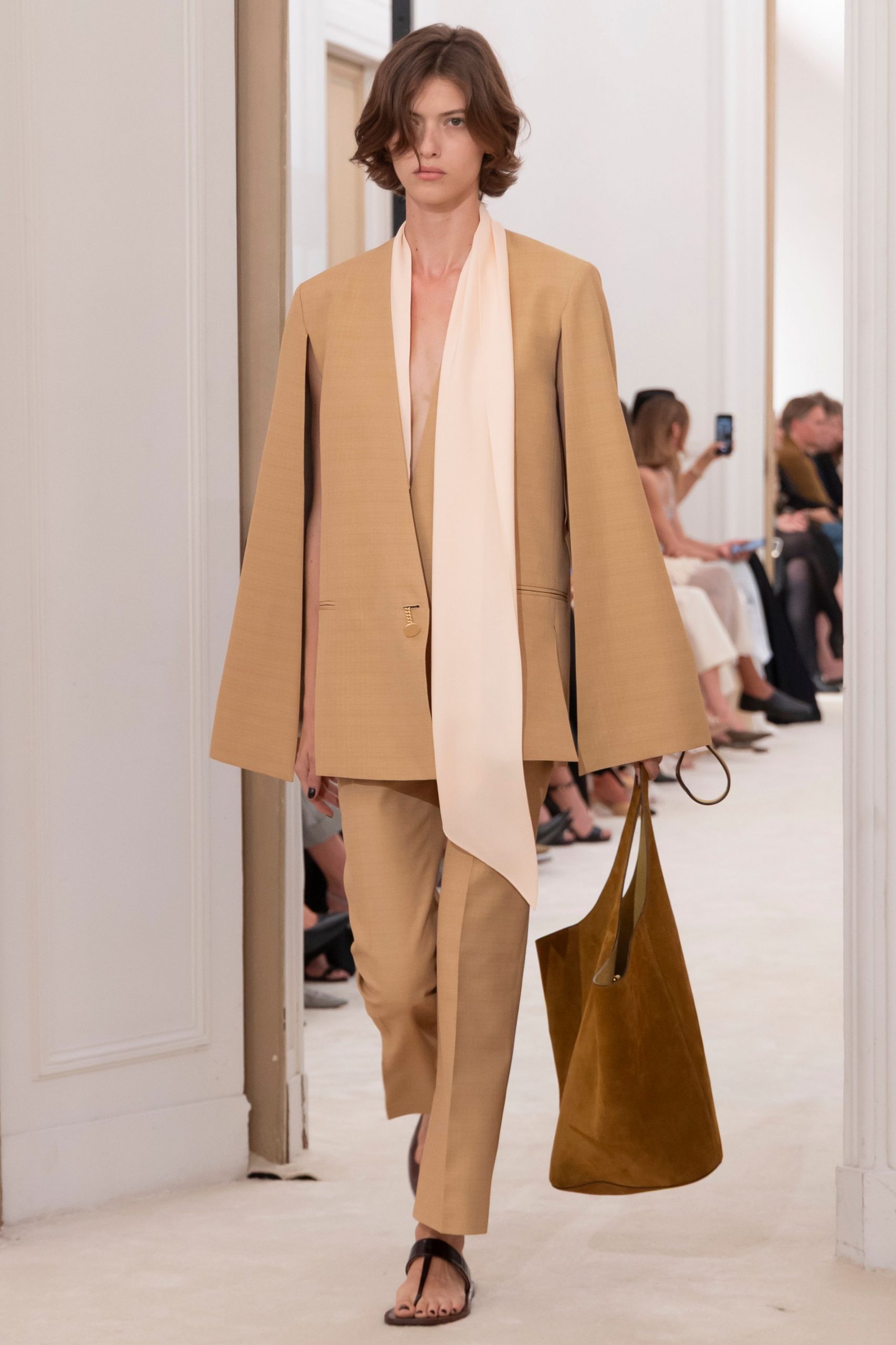 beige blazer and tailored pants