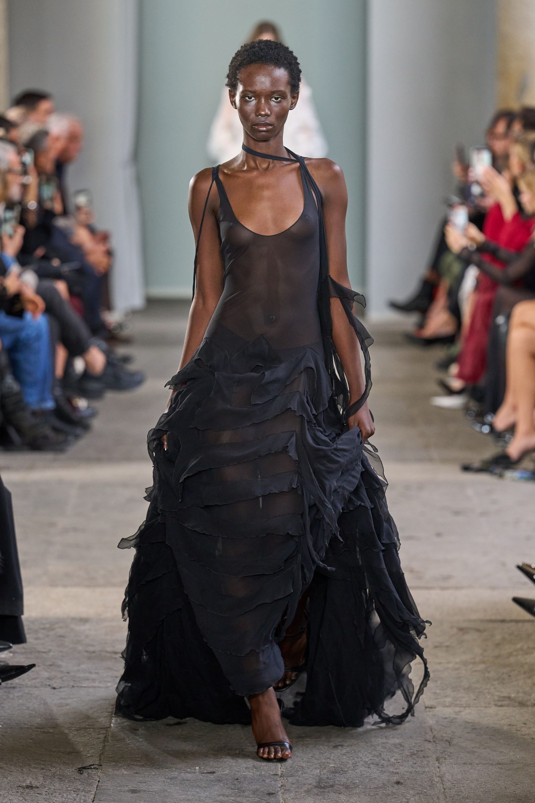 black sheer ruffled gown