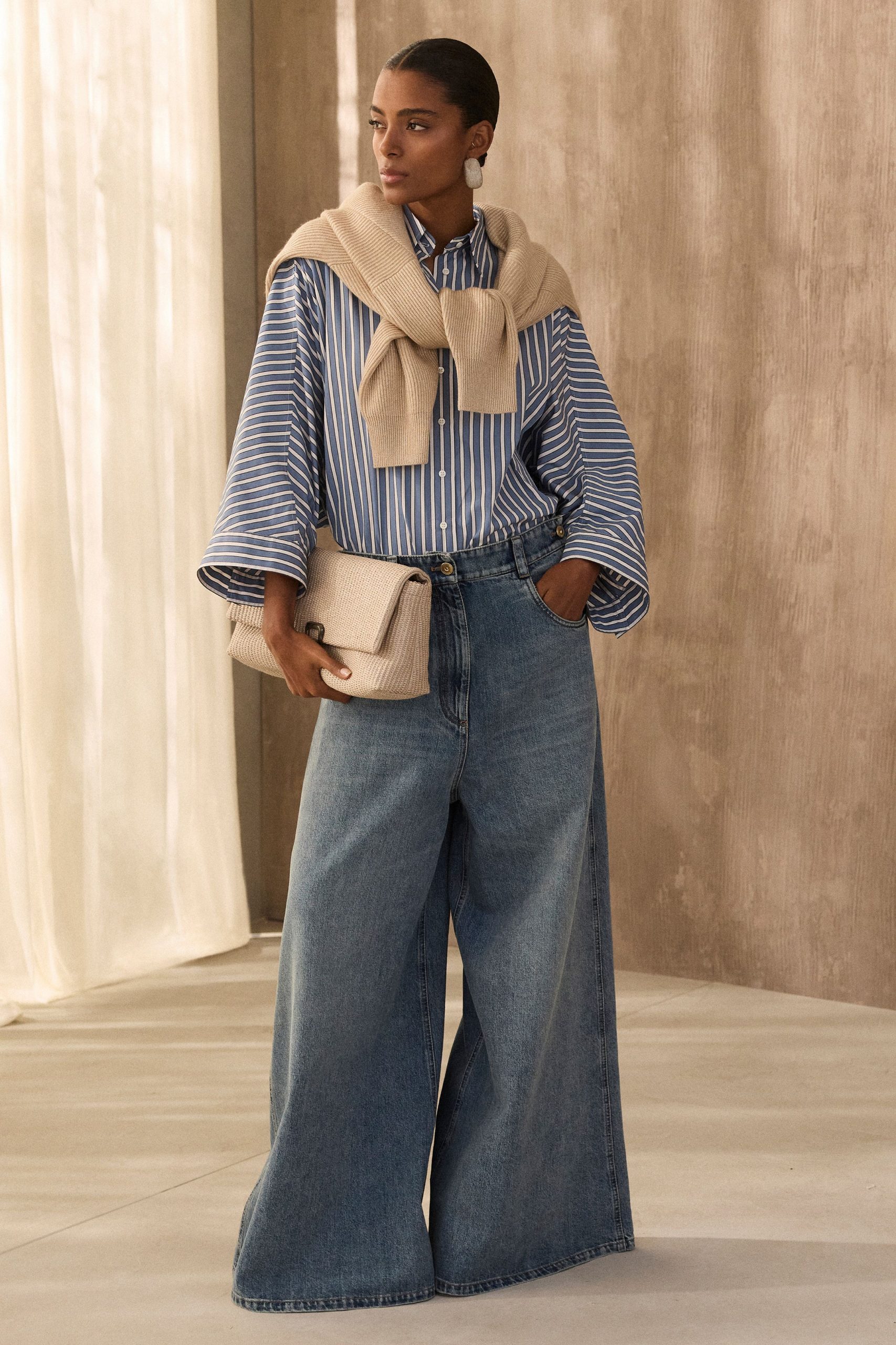 blue striped shirt with wide-leg jeans