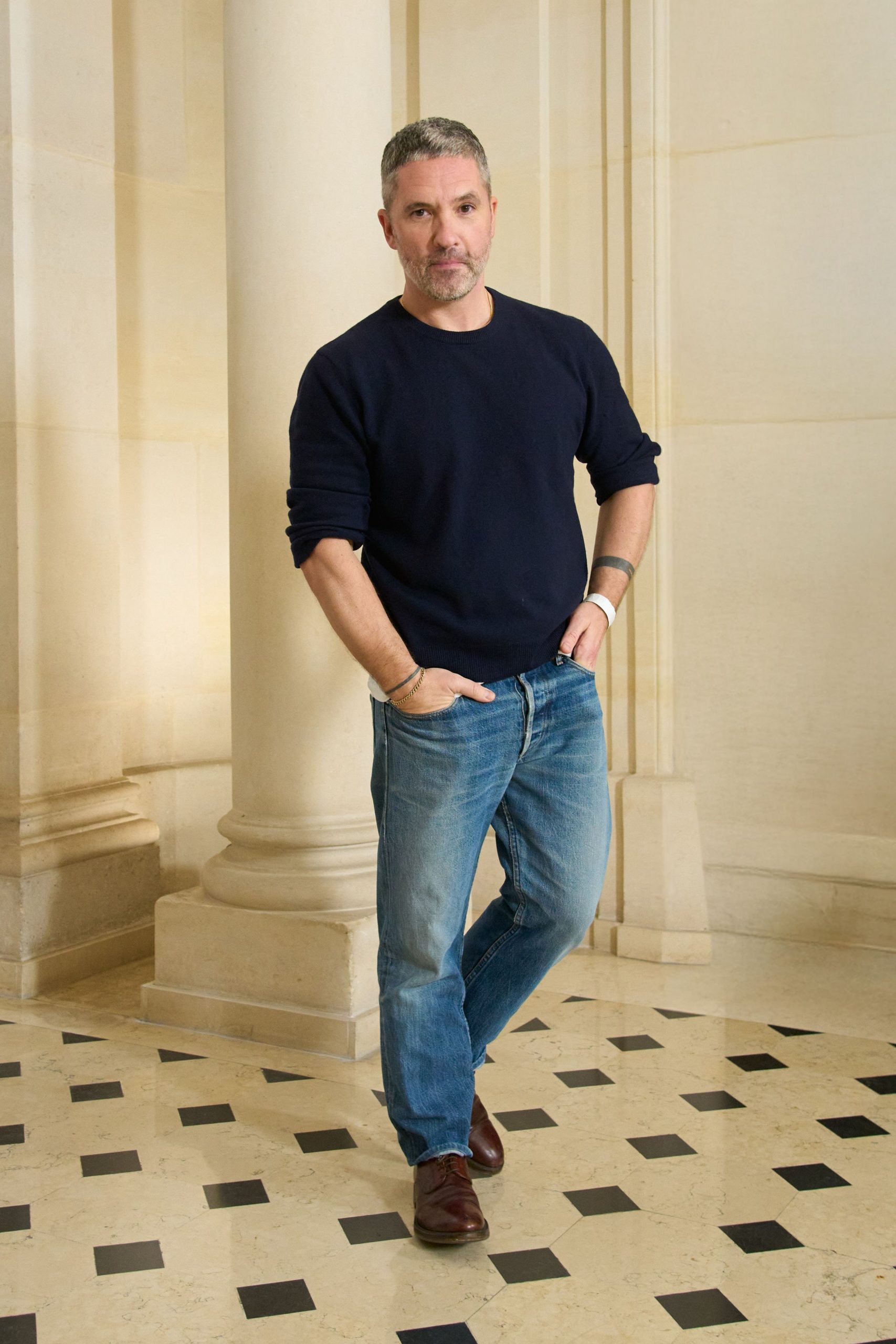 navy sweater with blue jeans