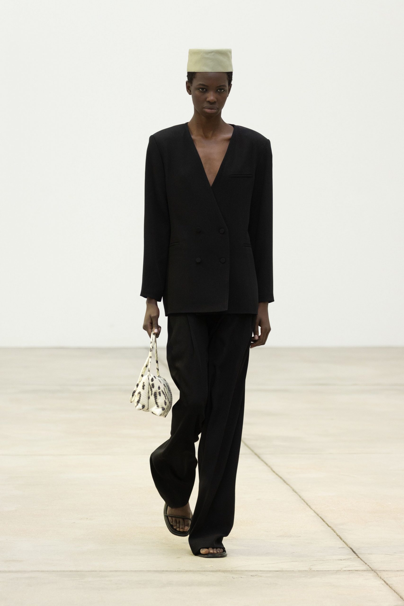 black tailored blazer with relaxed pants