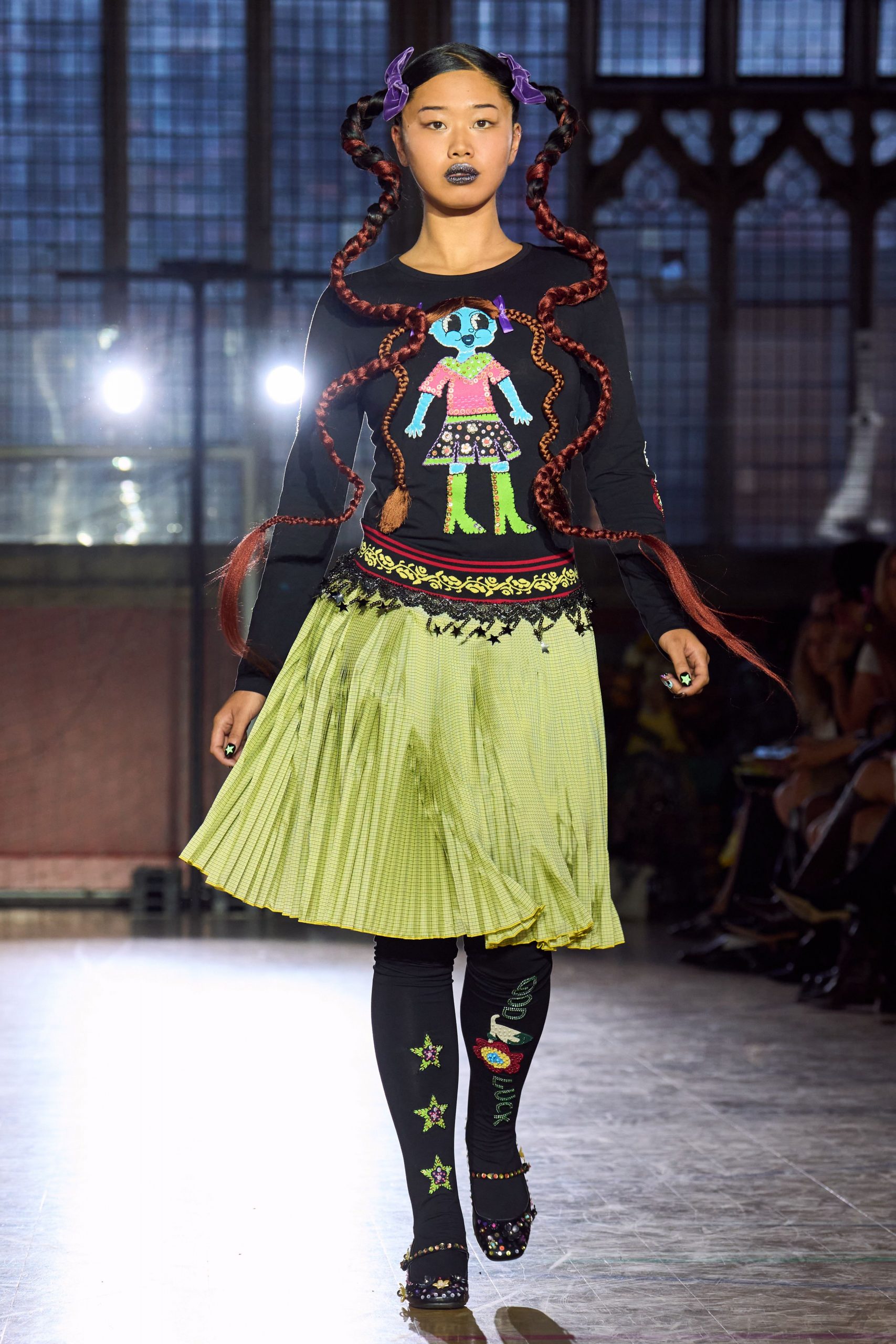 black top green pleated skirt