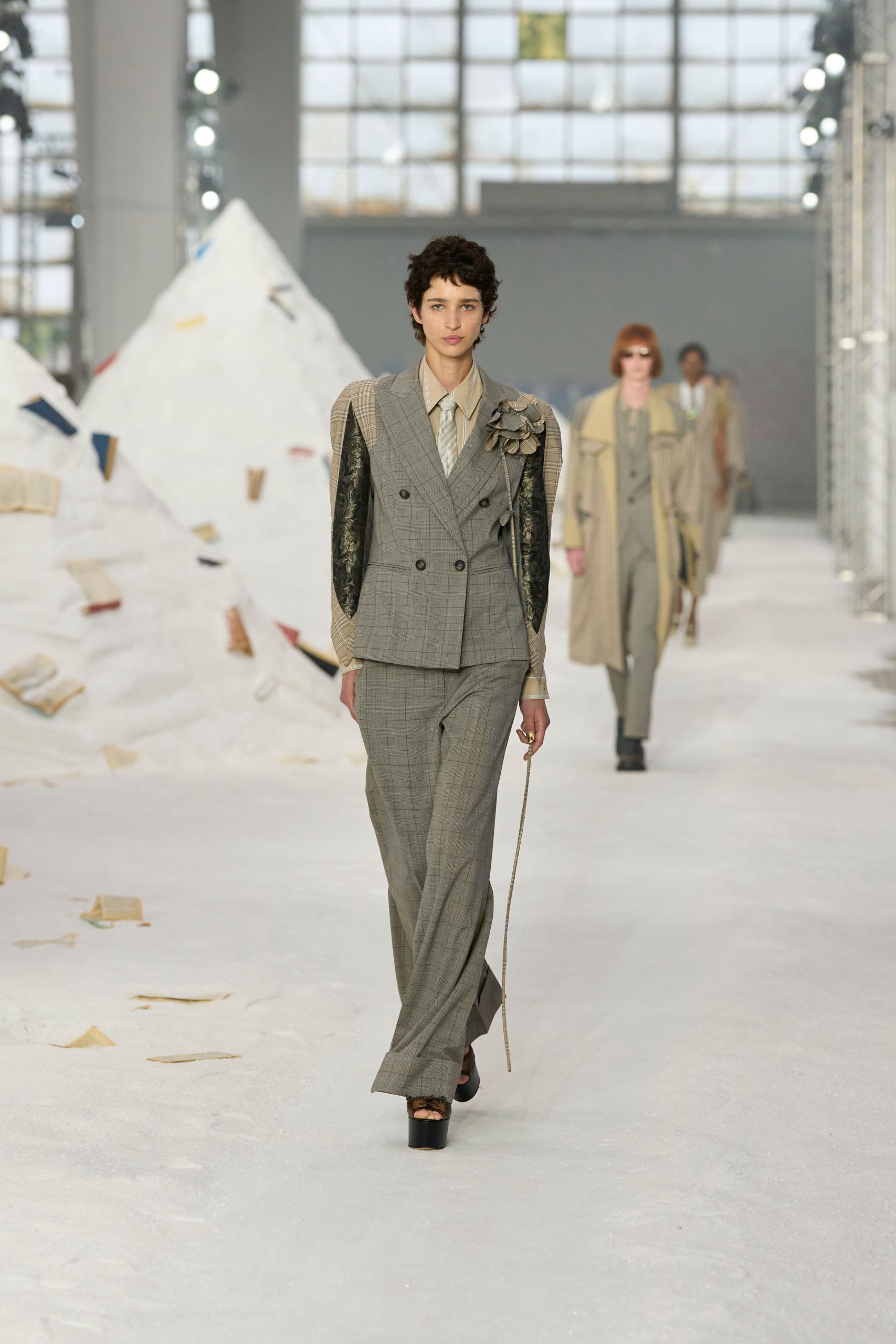 gray tailored suit with platform shoes