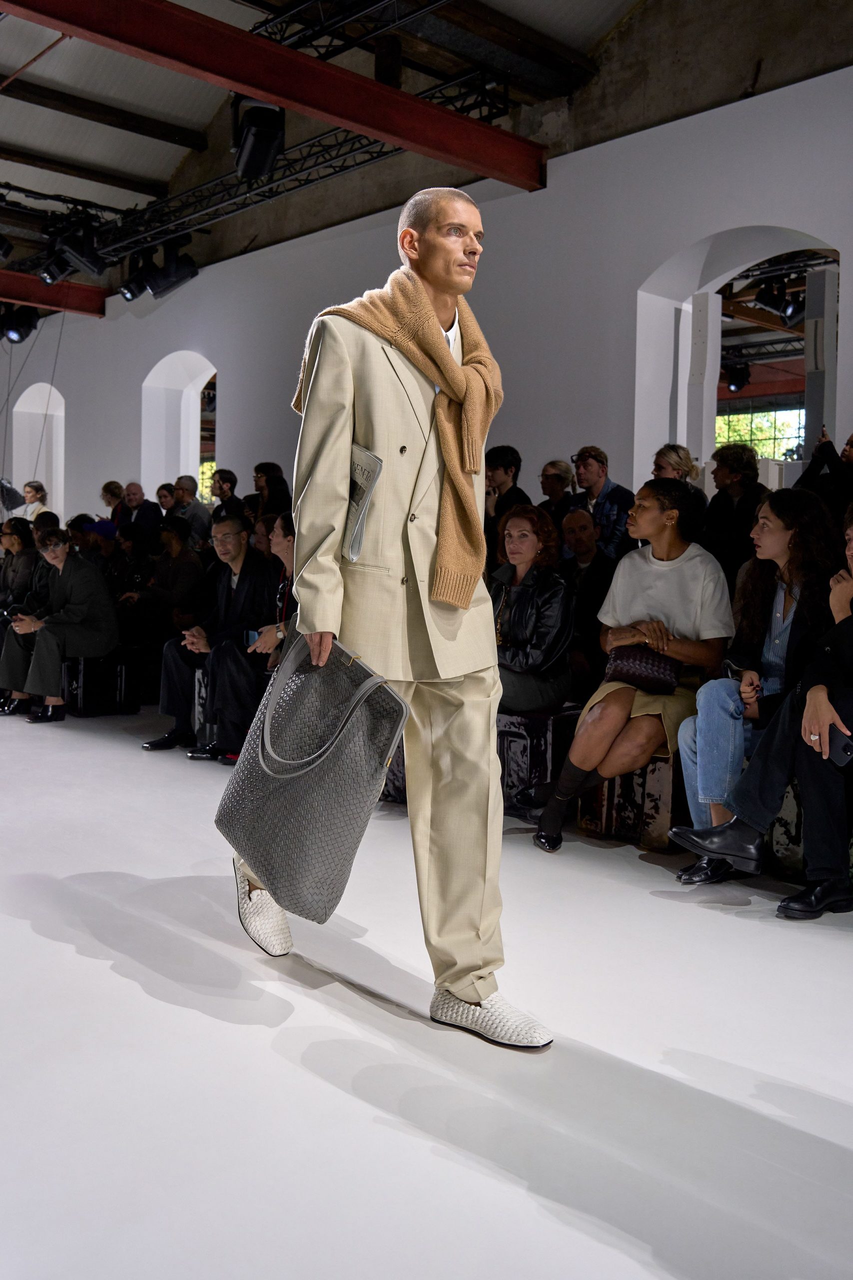 beige tailored suit with brown sweater