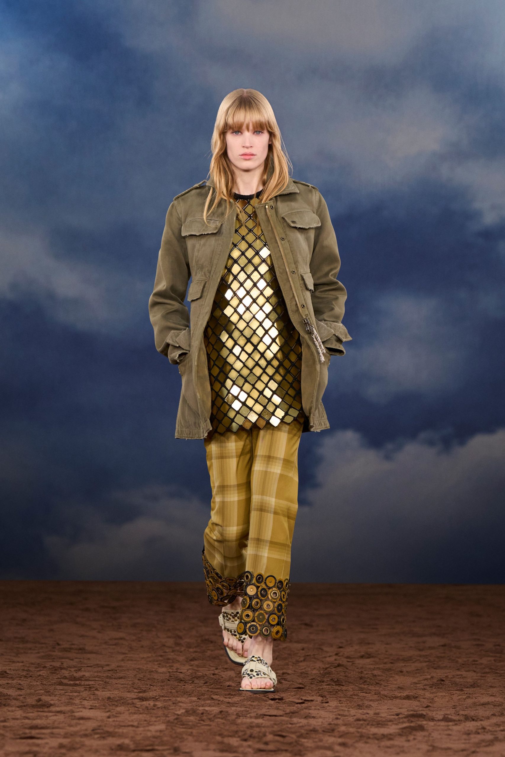 green jacket gold mesh top yellow pants