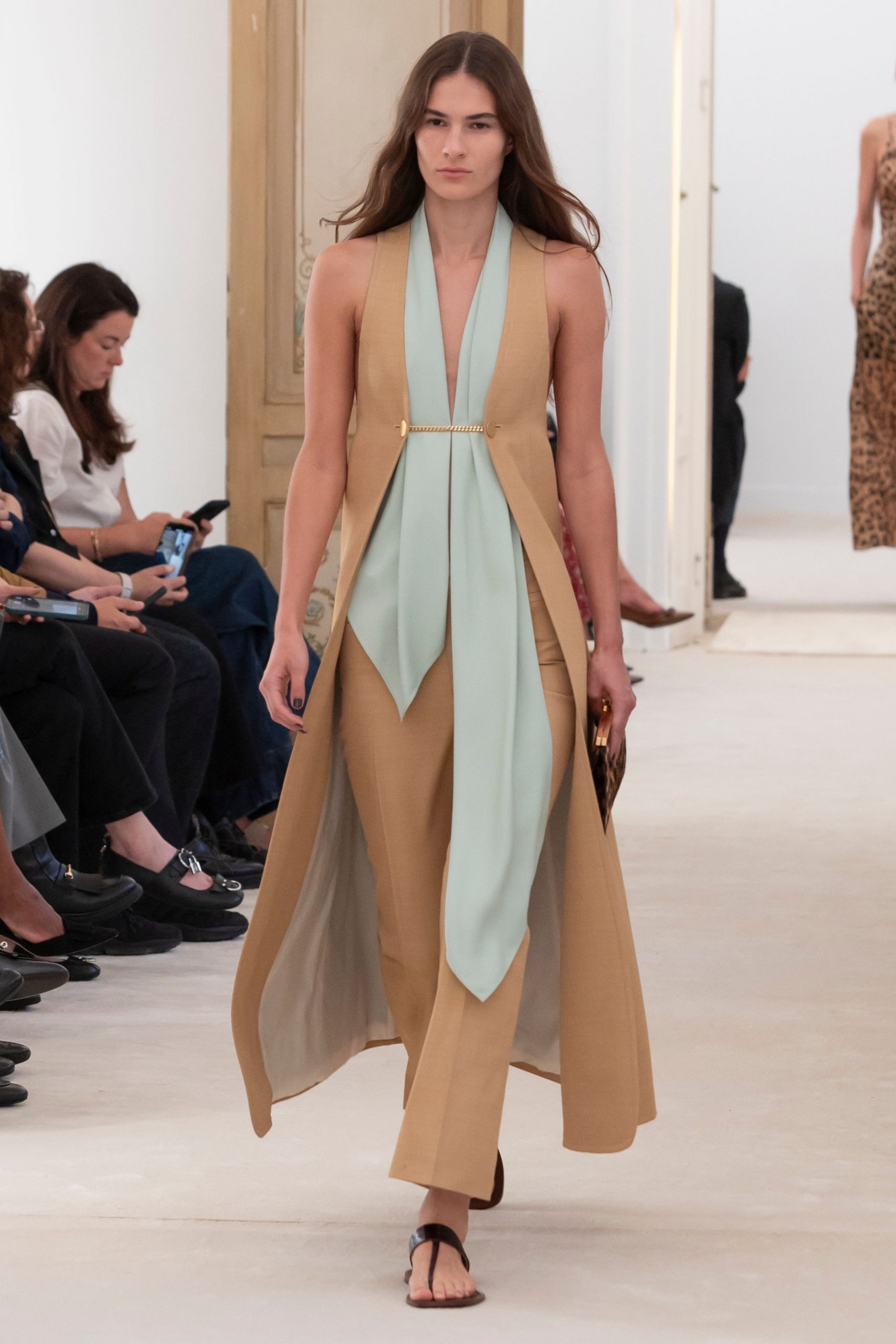 beige fitted jumpsuit with light blue top