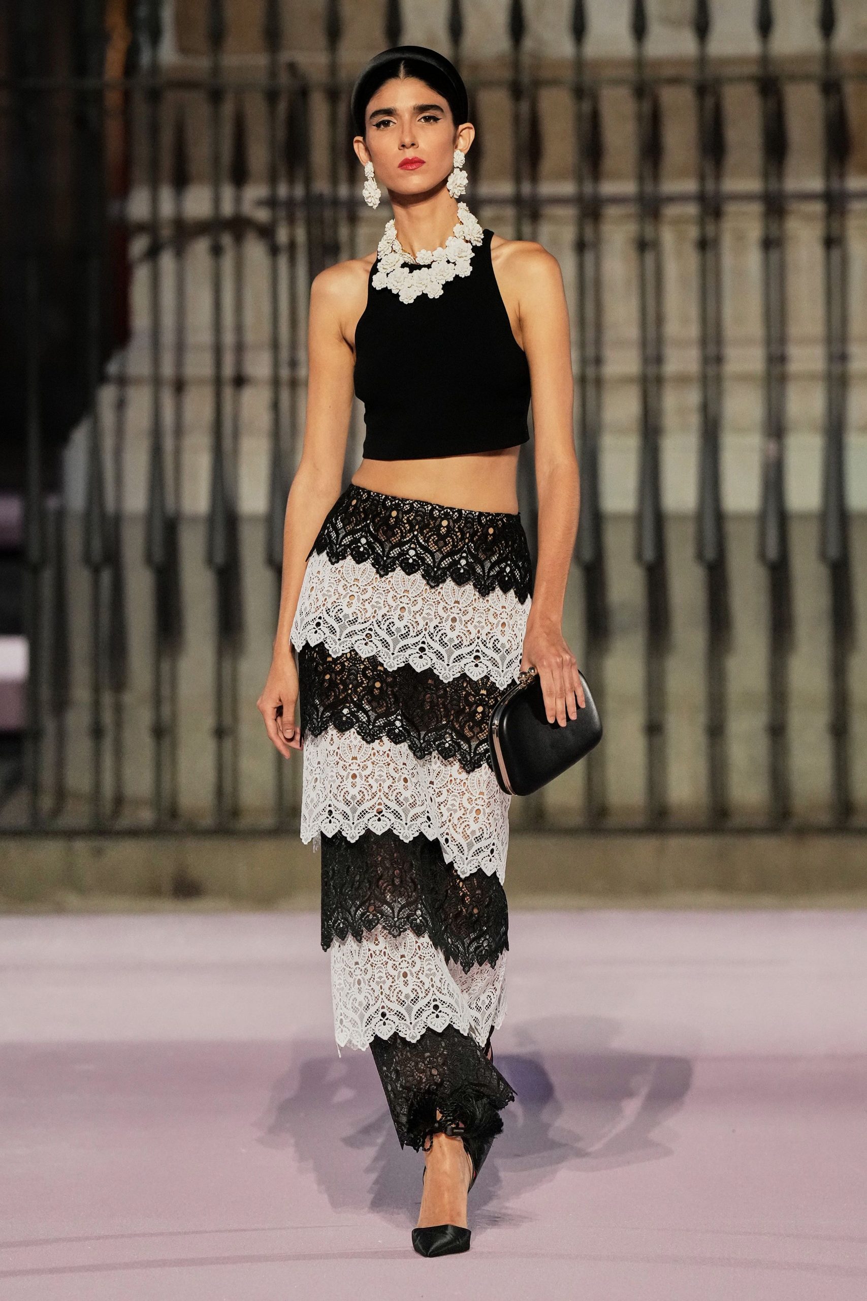 black crop-top and tiered lace skirt