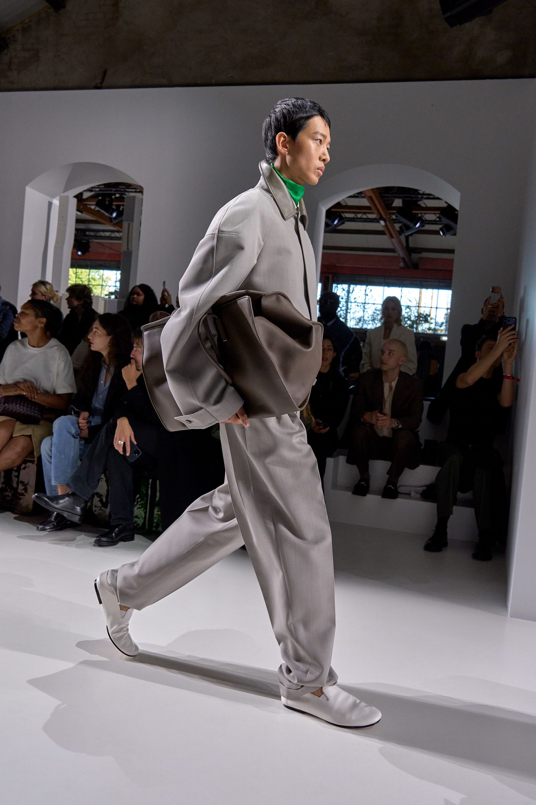gray relaxed suit with white shoes