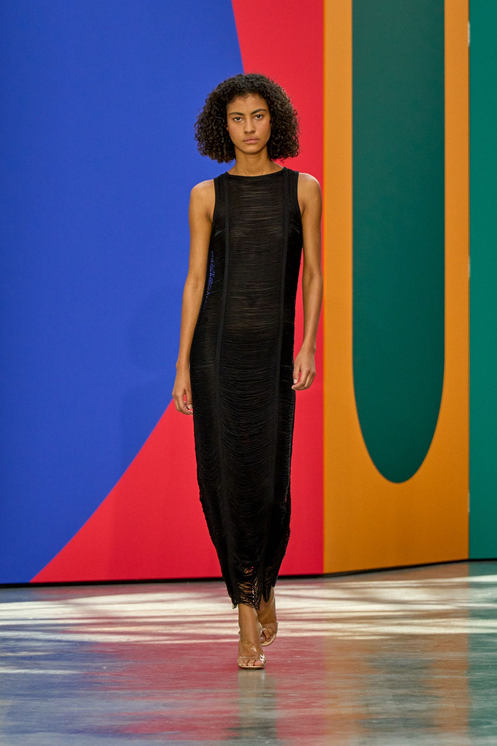 black ruched maxi dress with strappy shoes