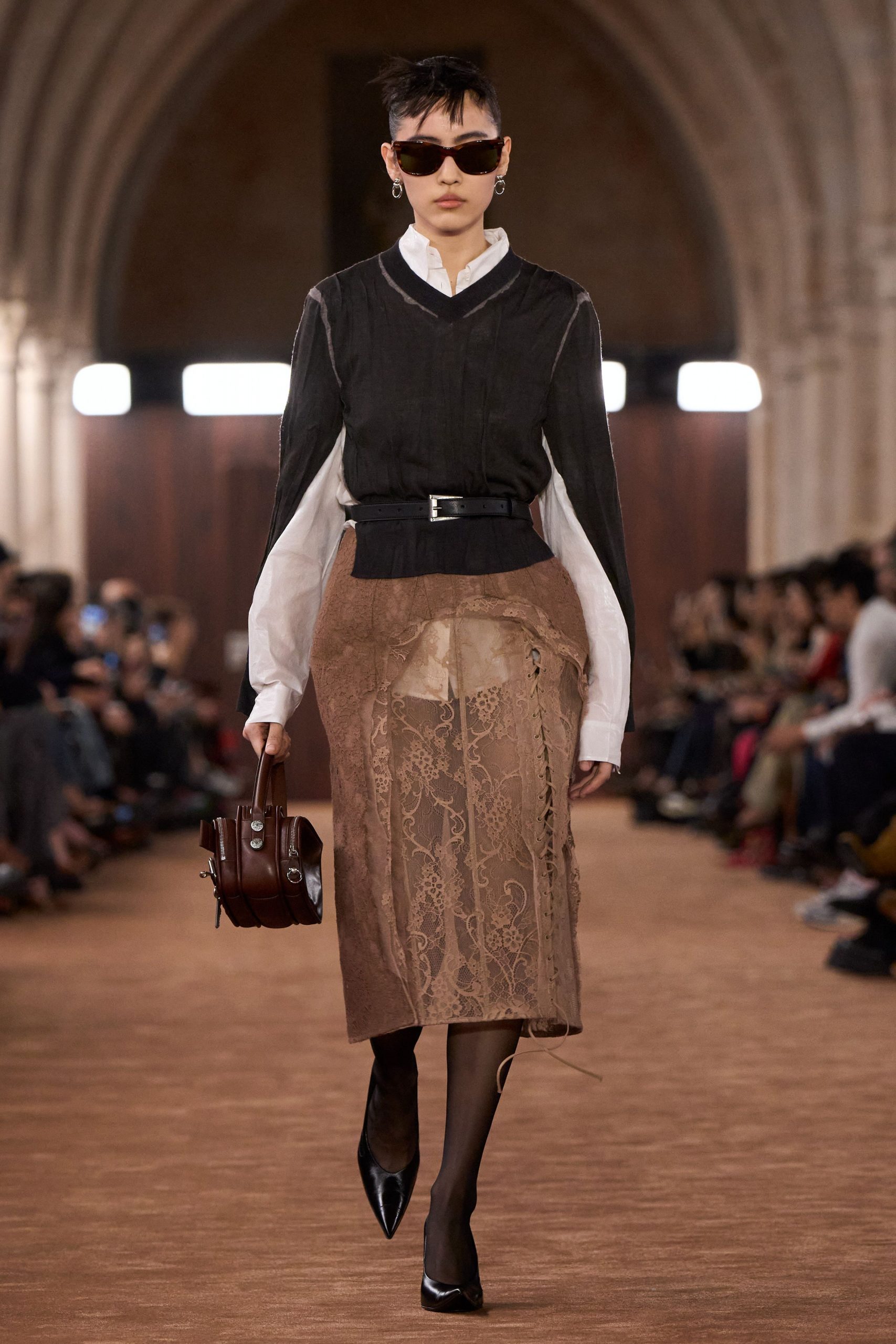 black top white blouse brown skirt