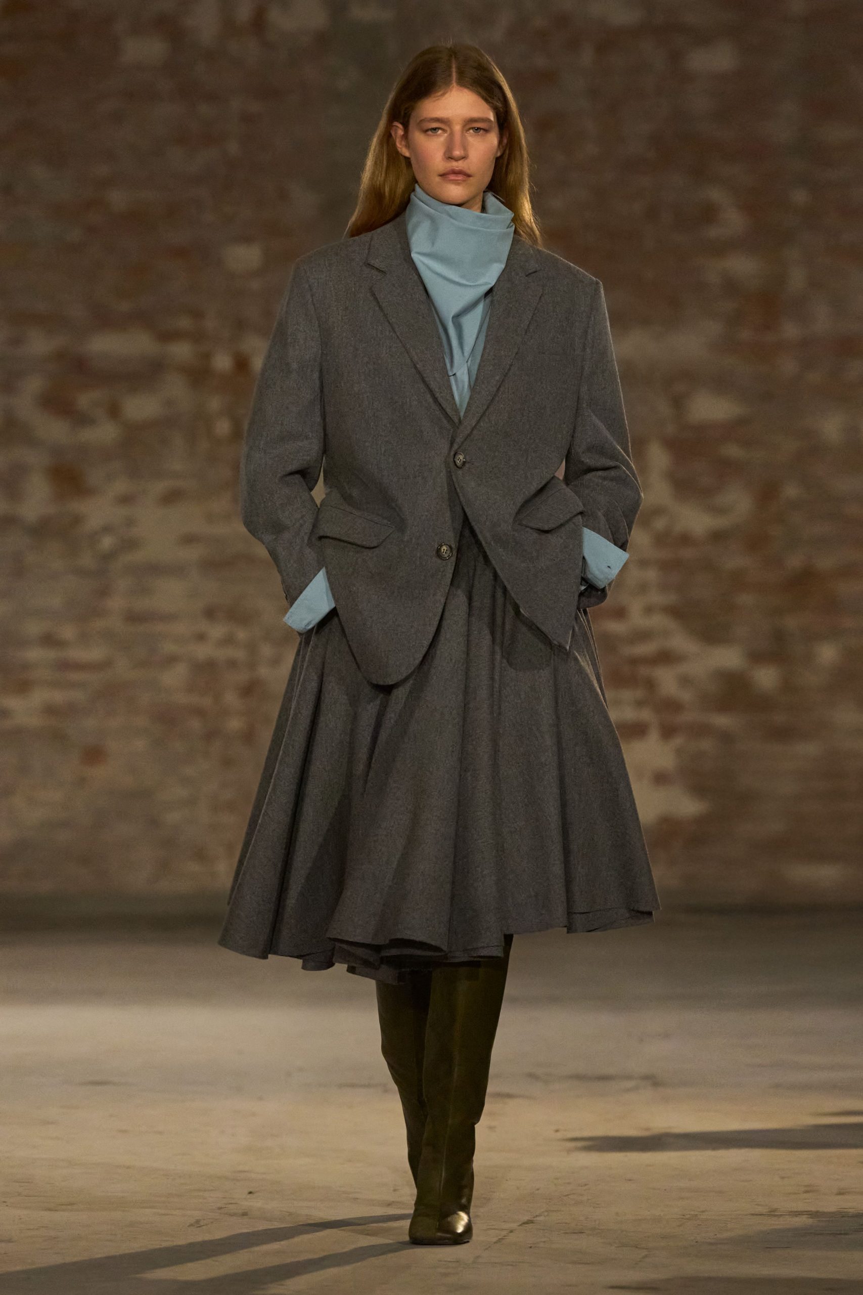 gray blazer blue top gray skirt green boots