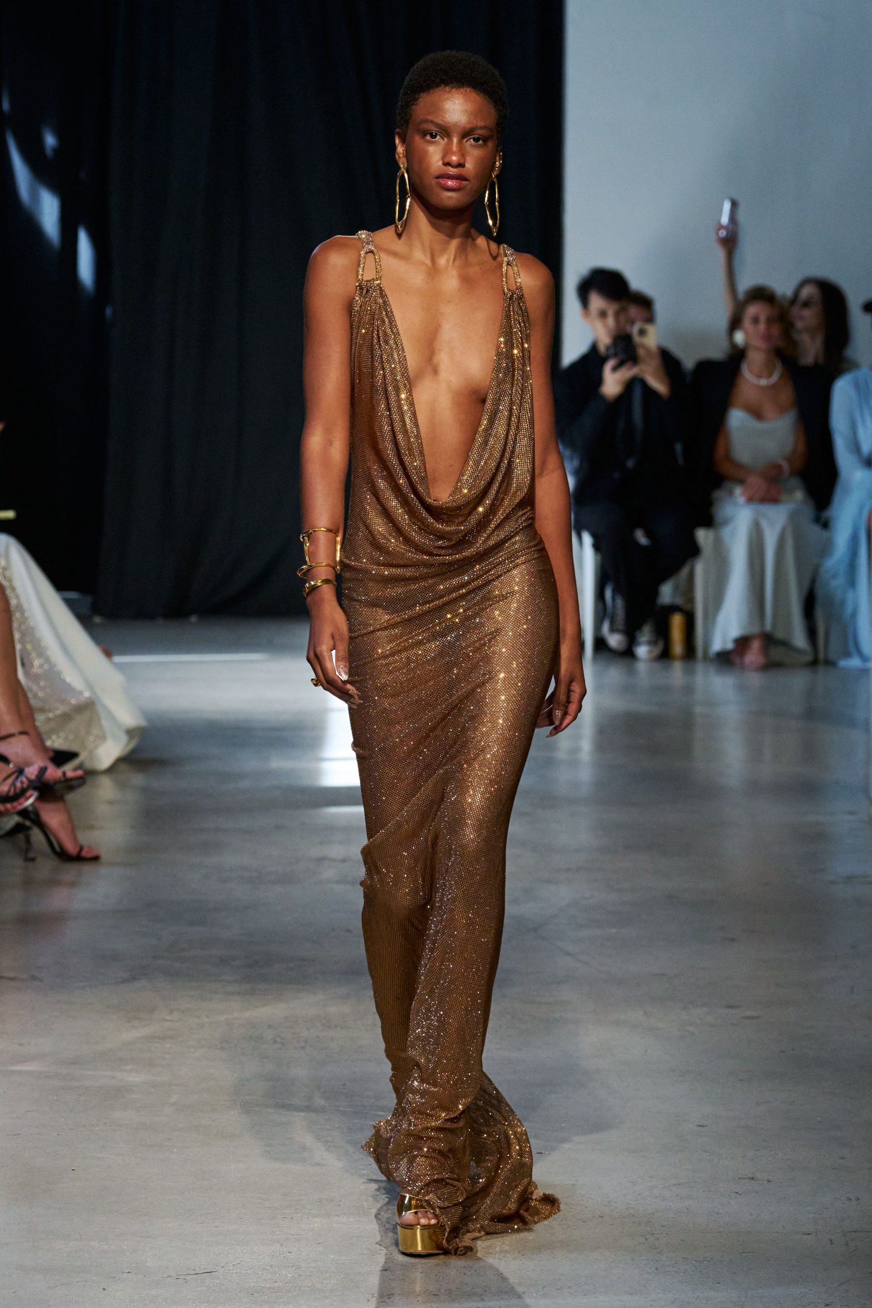 gold silk sleeveless v-neck fitted draped shiny gown