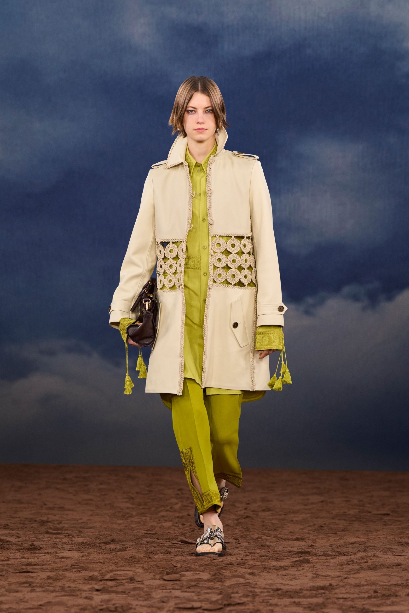 beige coat with green outfit
