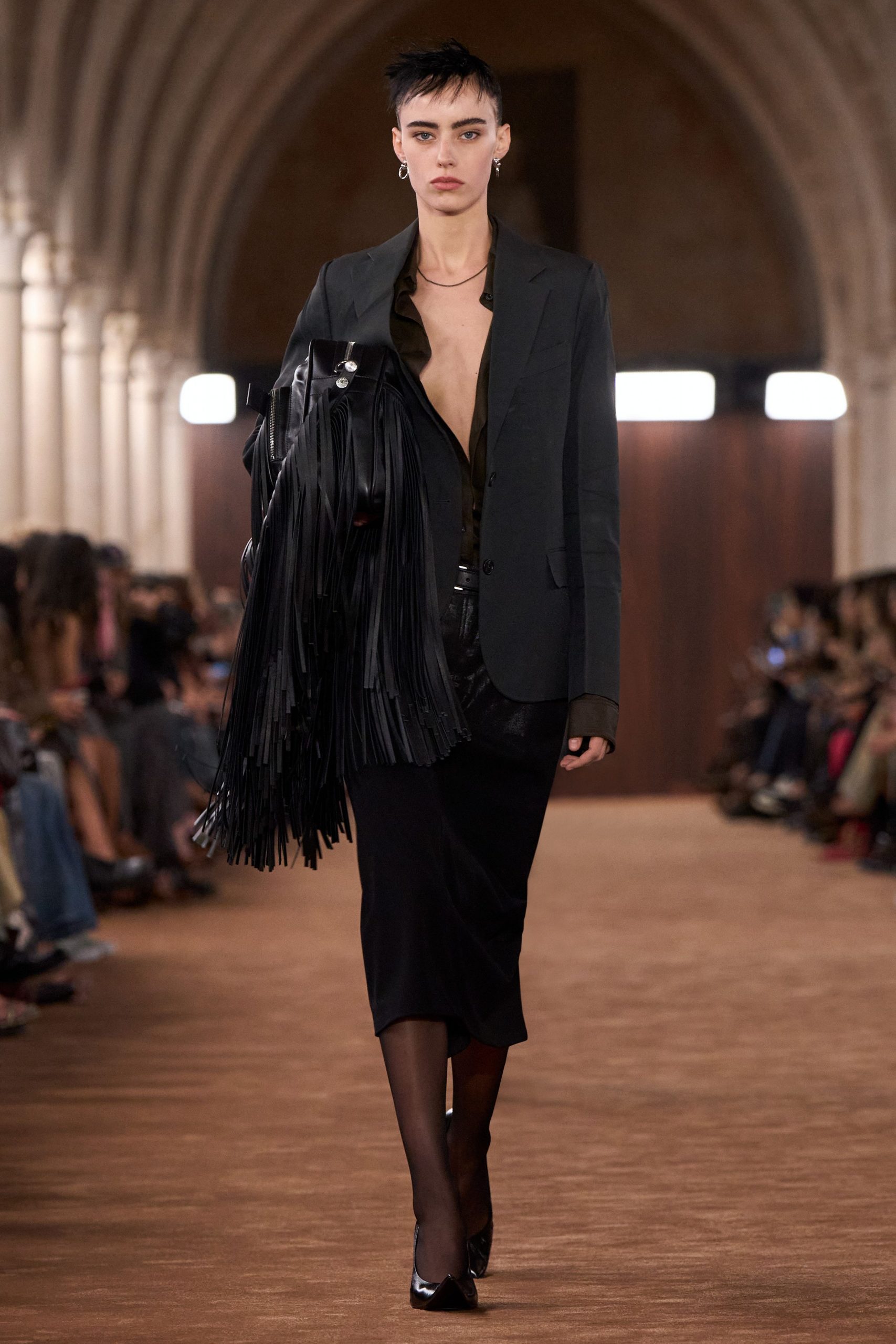black tailored blazer with fringe bag