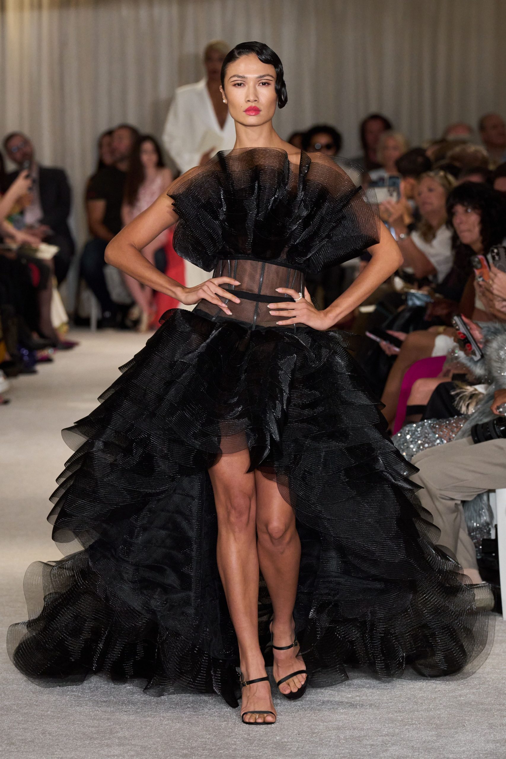 black ruffled gown with heels