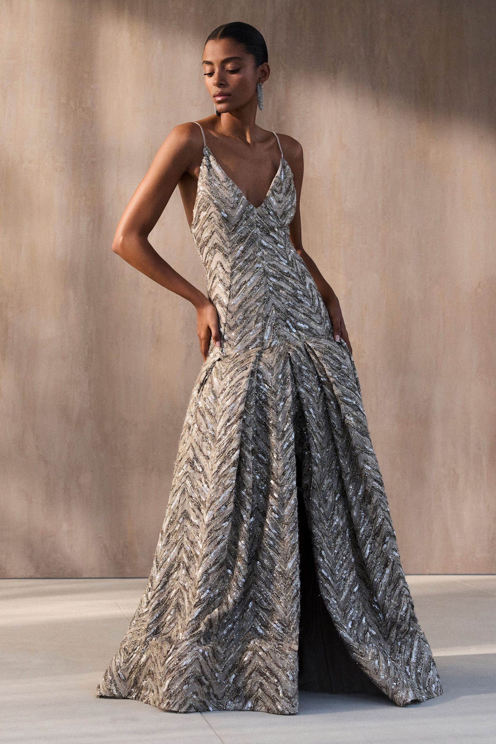 silver sequined sleeveless gown