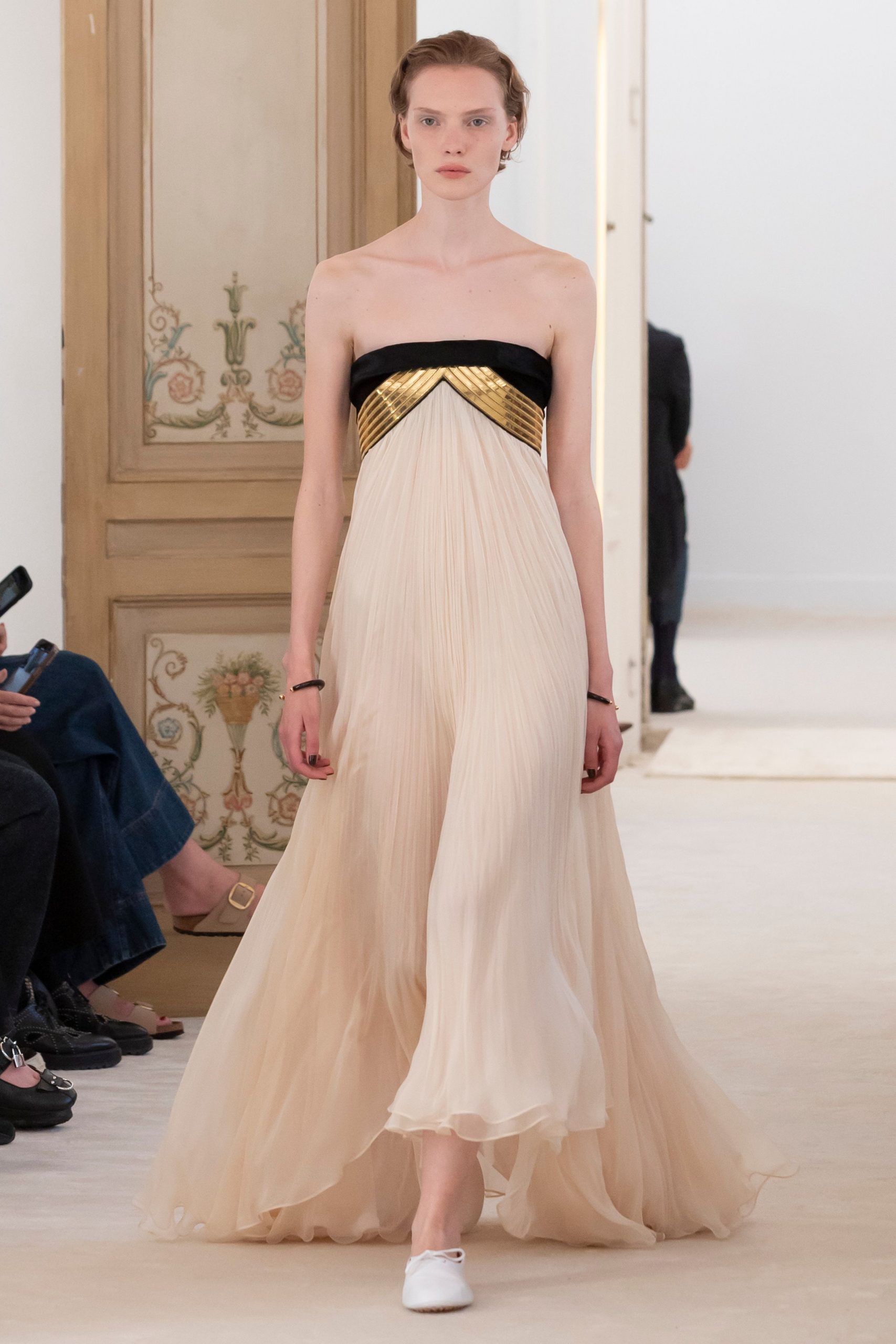 black and beige pleated gown