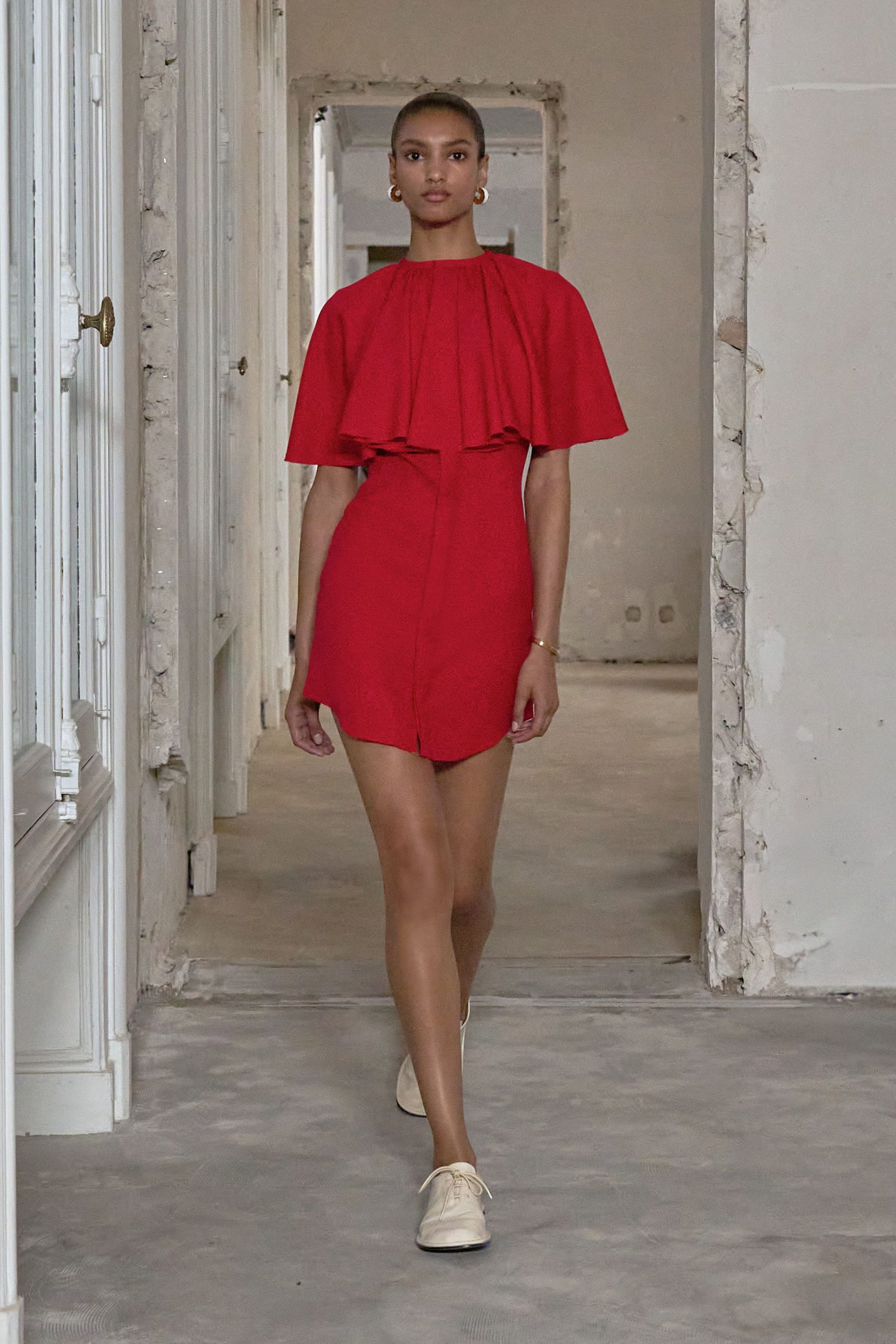 red cotton sleeveless high-neck fitted pleated mini dress
