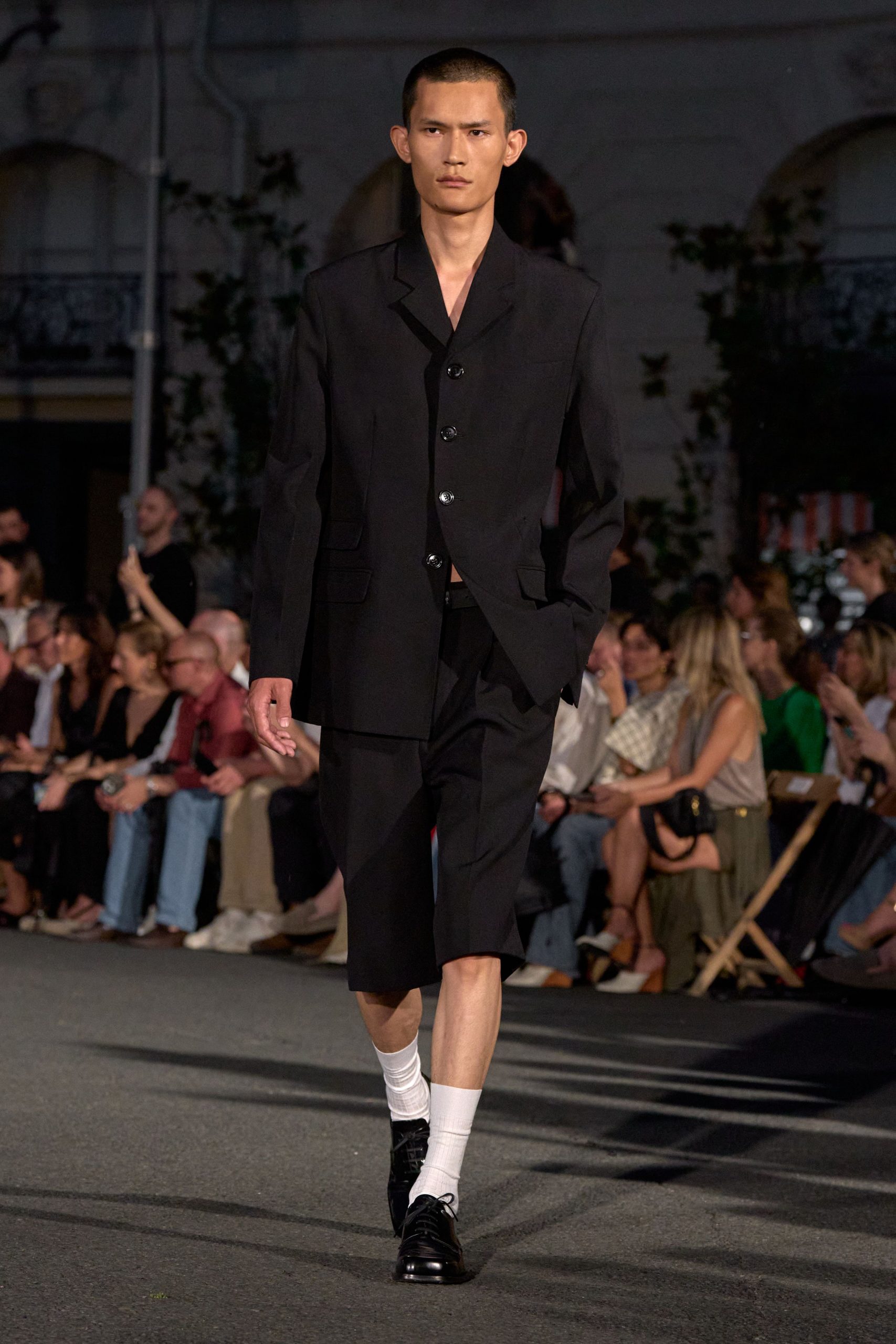 black short-sleeve collared tailored buttoned suit