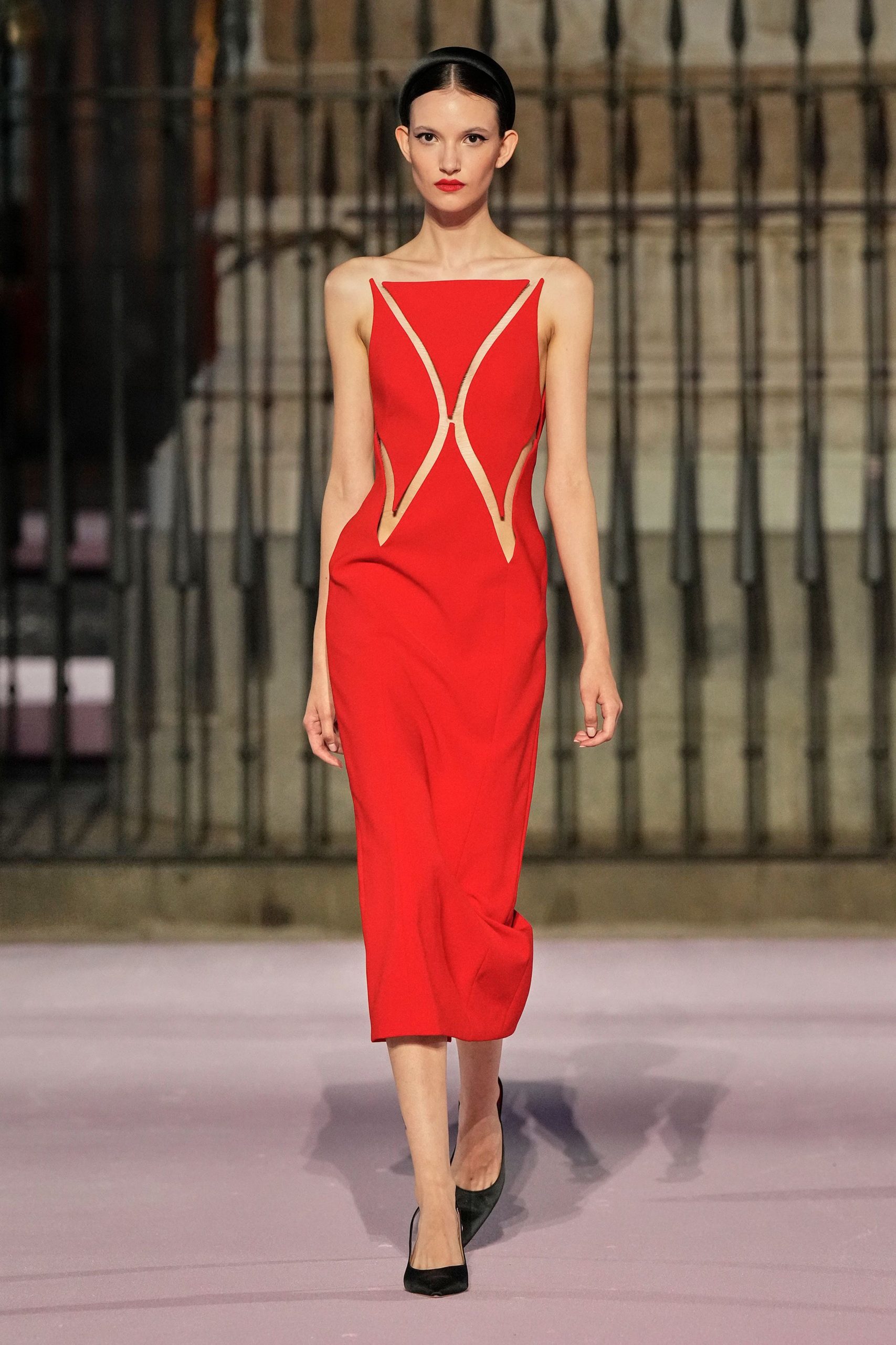 red fitted midi dress with cutouts