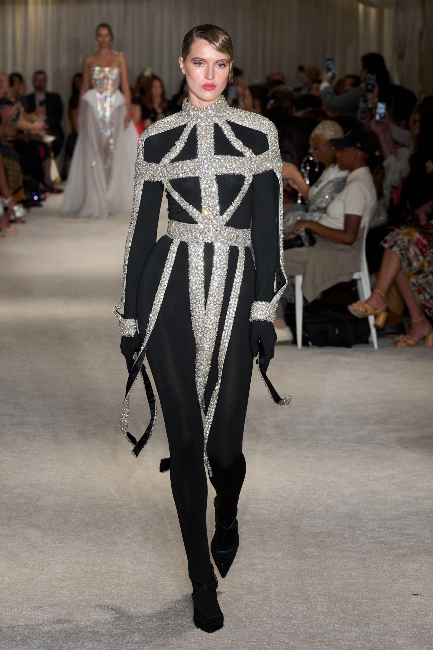 black embellished catsuit with gloves