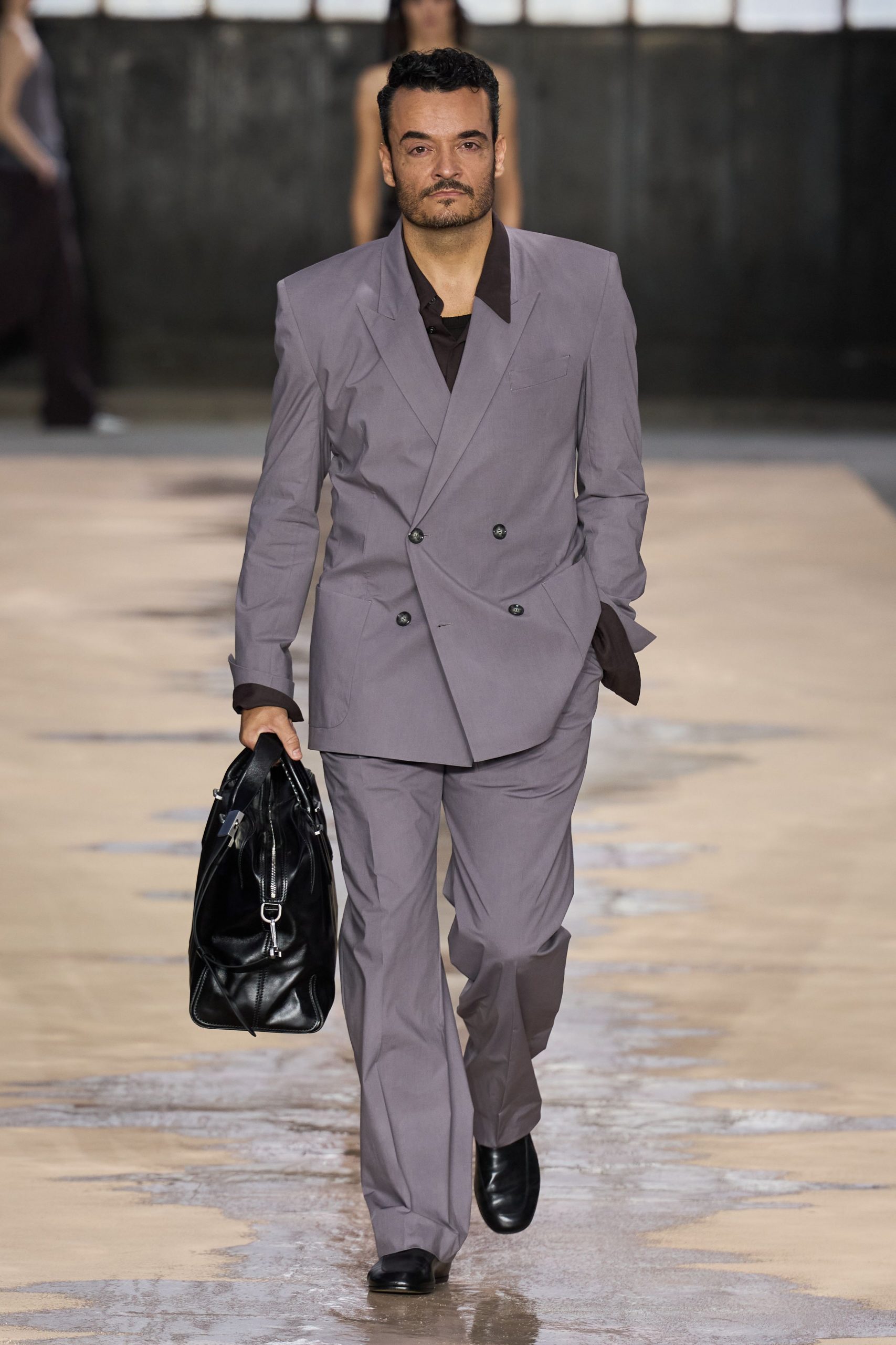 gray tailored suit with brown shirt