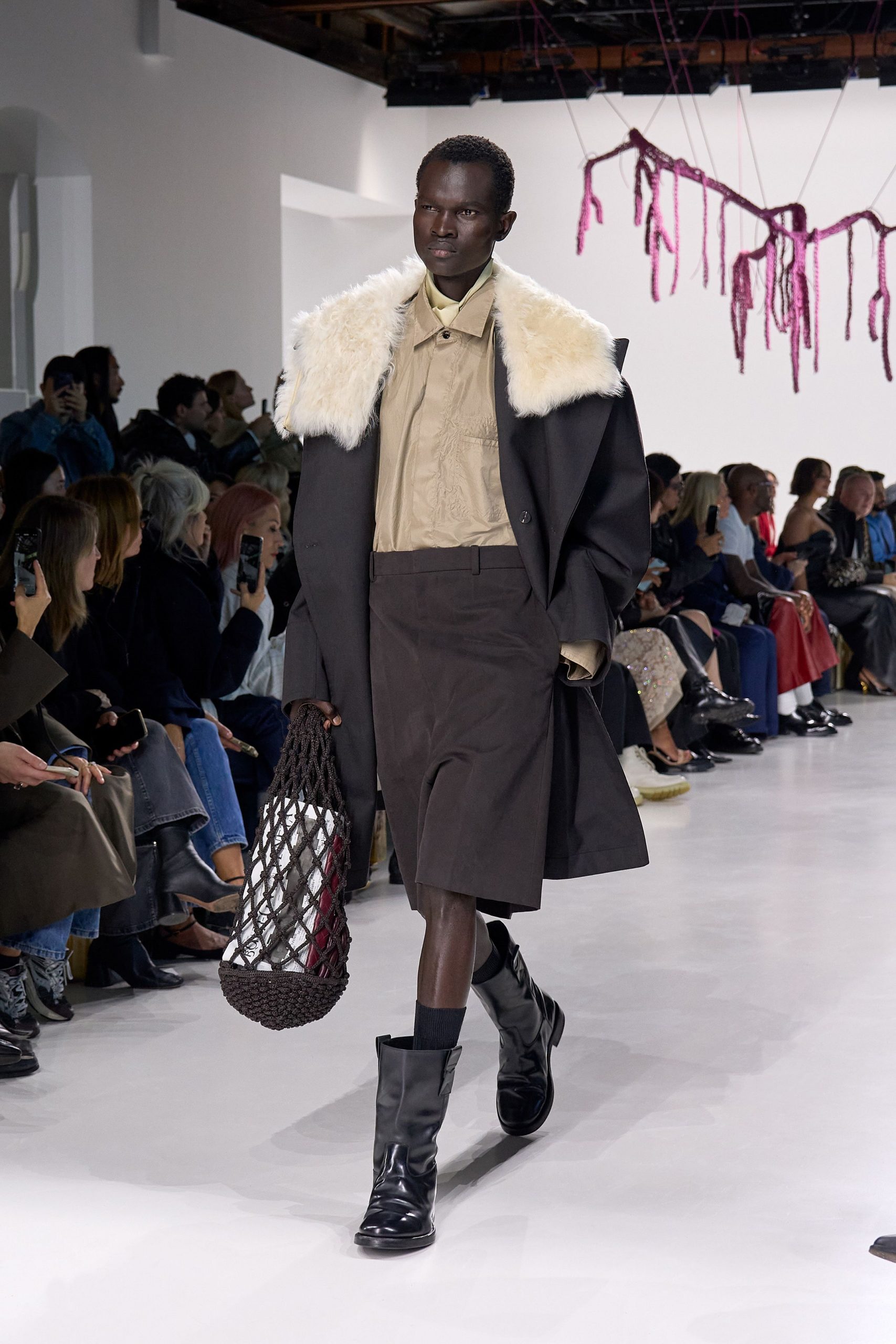 black wool coat beige shirt brown skirt