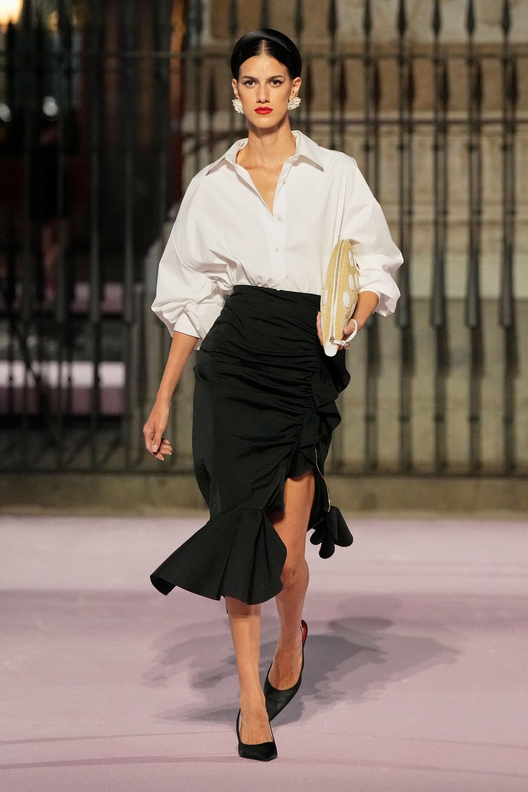 white relaxed shirt black ruffled skirt