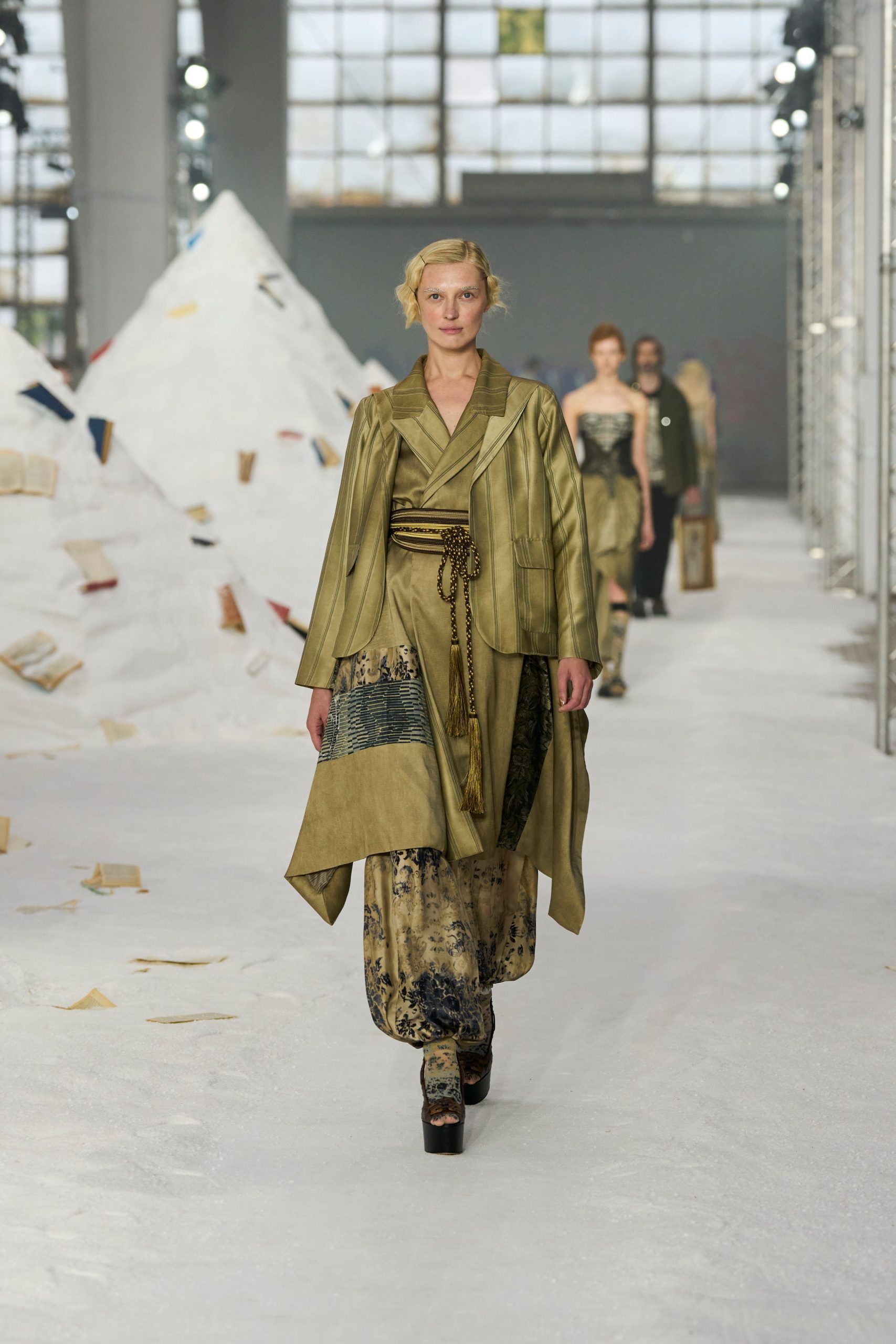 green silk coat with wide-leg pants