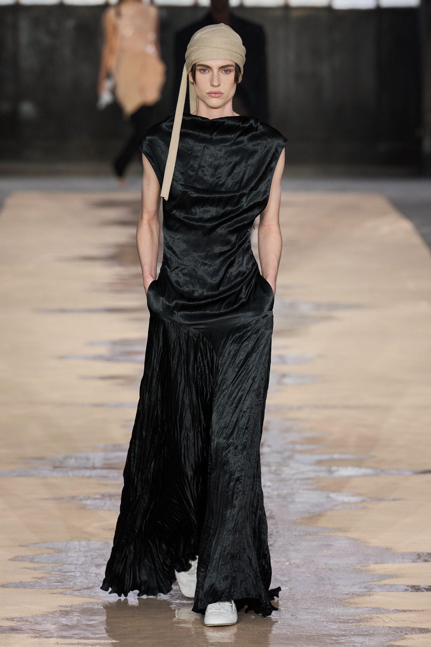 black silk sleeveless high-neck fitted draped flowing dress