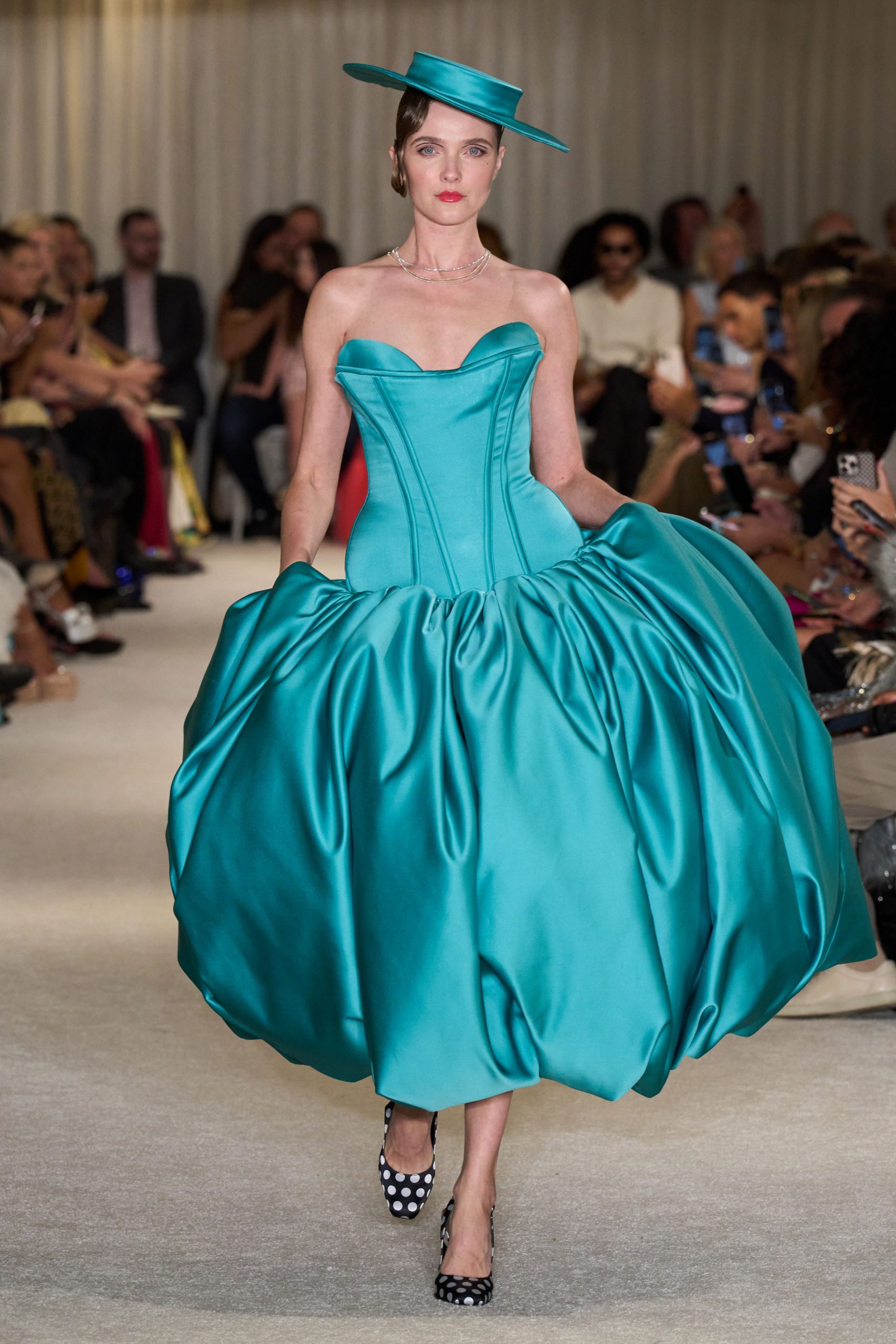 teal satin strapless fitted pleated flowing midi gown