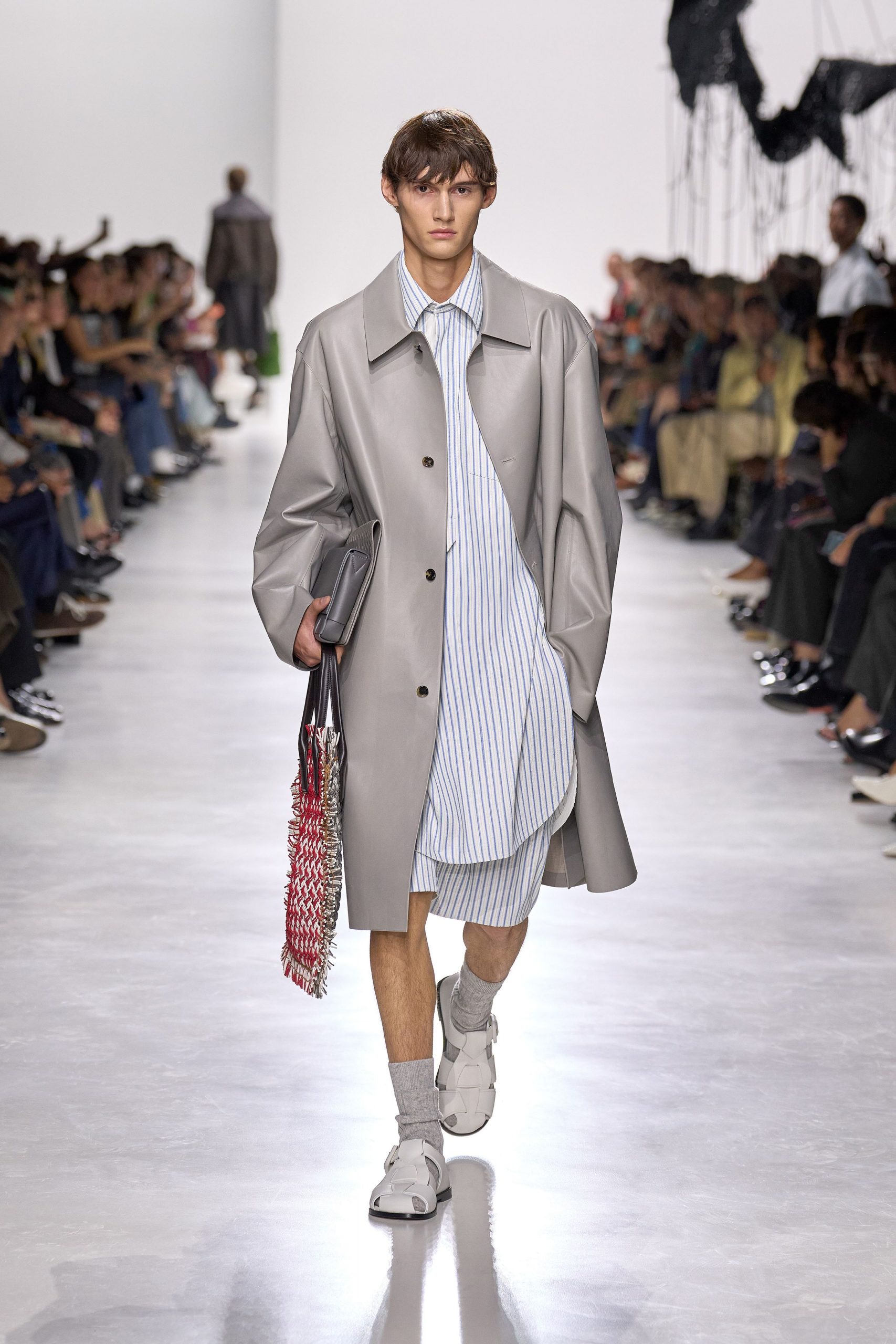 gray oversized coat with striped shirt