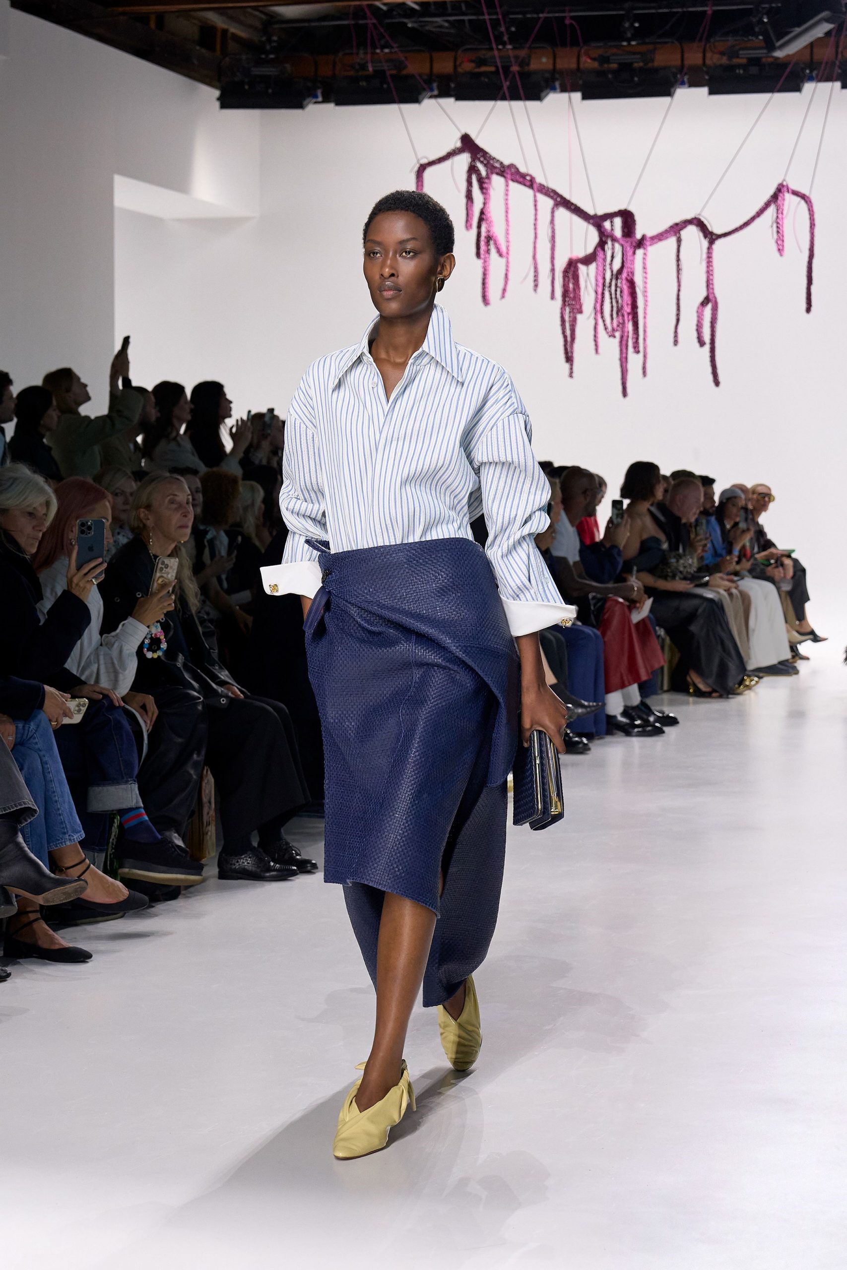 striped shirt with navy skirt