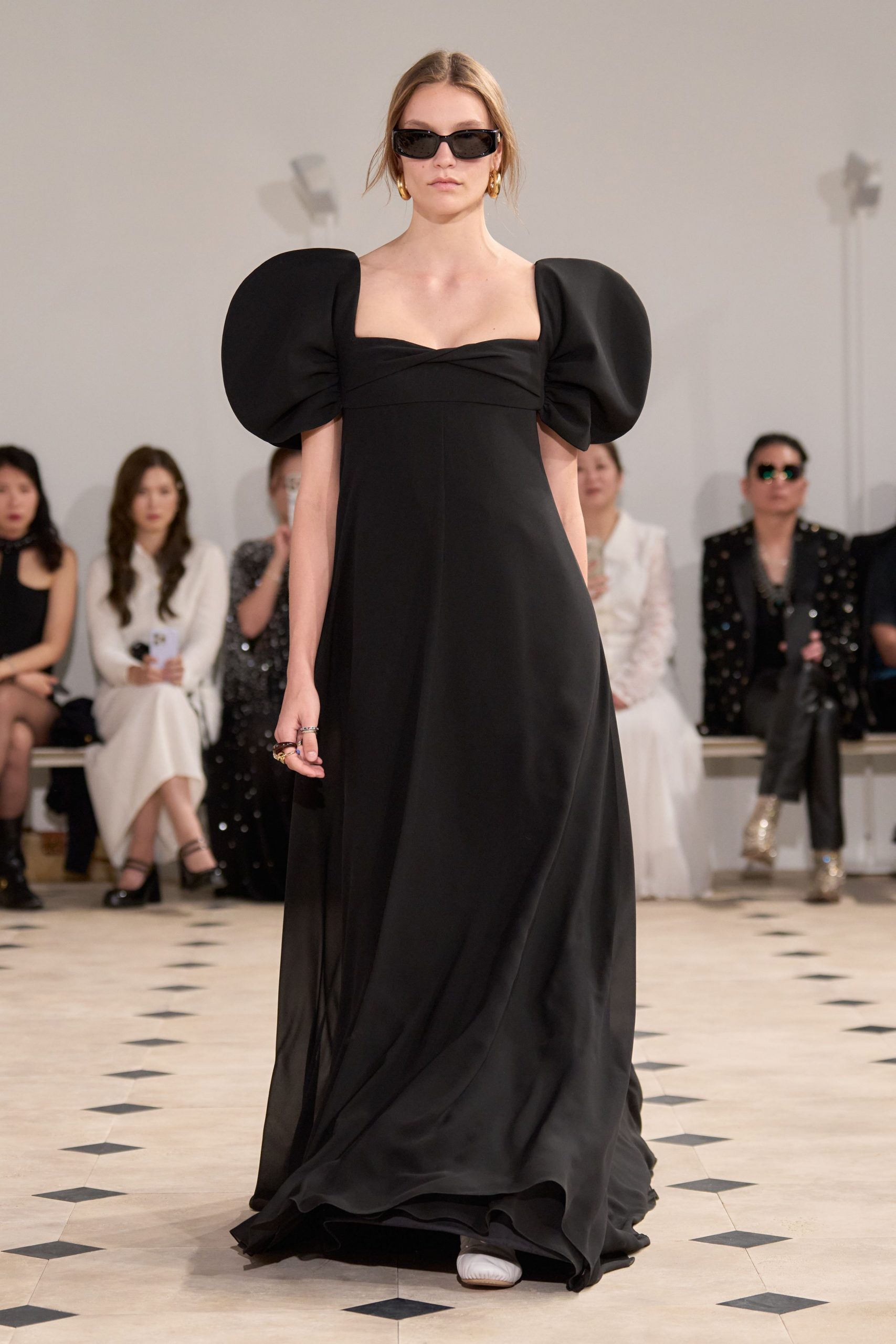 black silk sleeveless square-neck fitted padded flowing gown