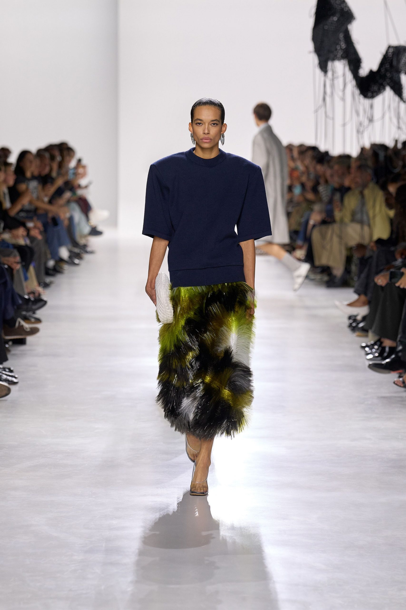 blue relaxed top with fur skirt