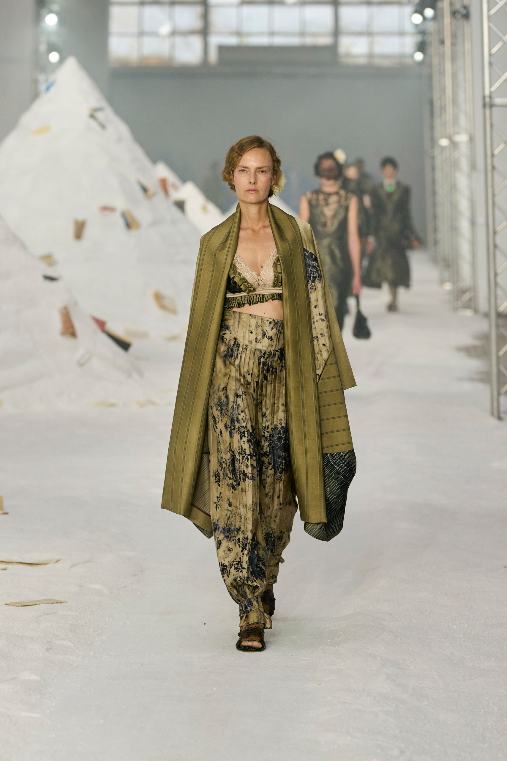 beige silk fitted flared pants