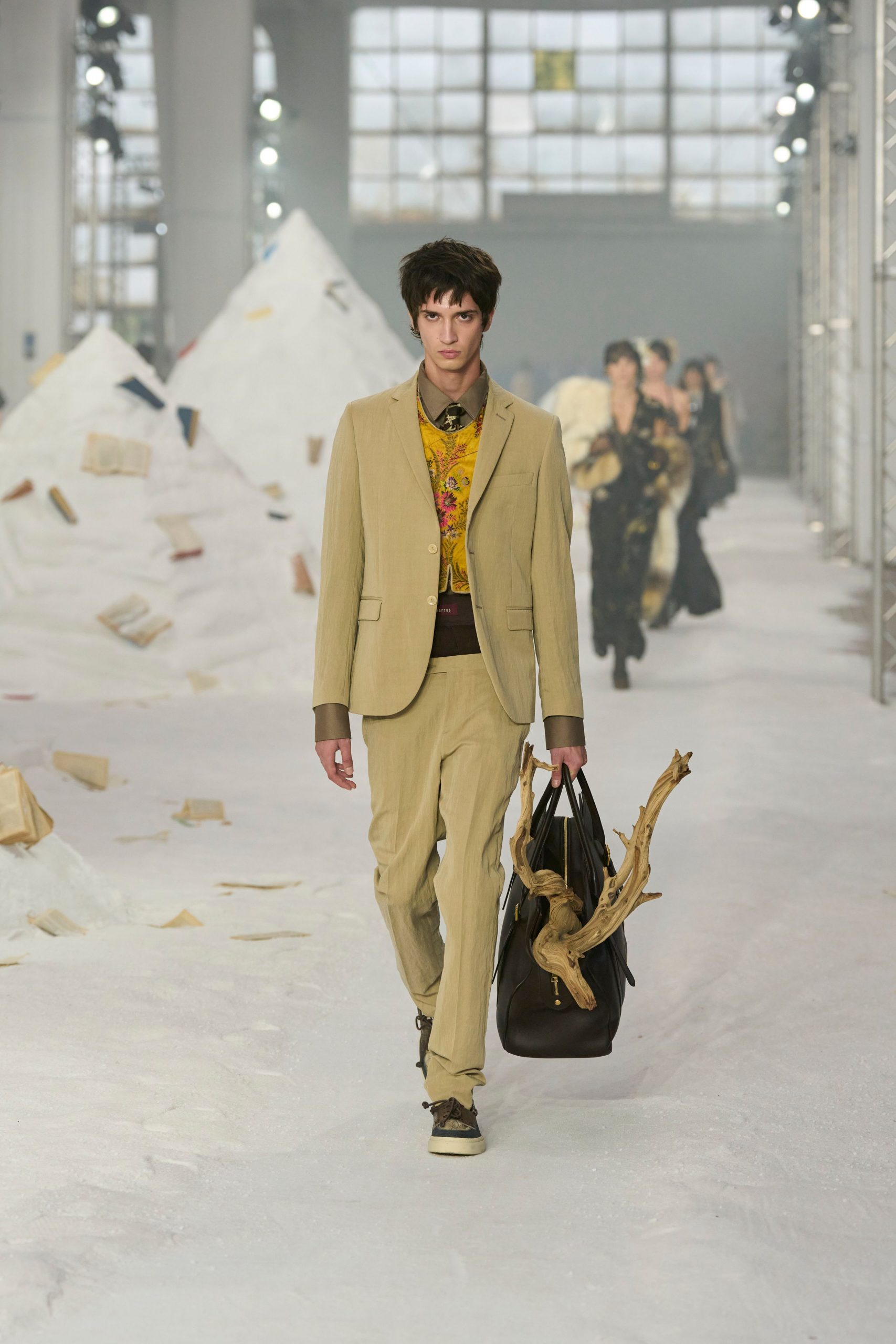 beige tailored suit with floral shirt