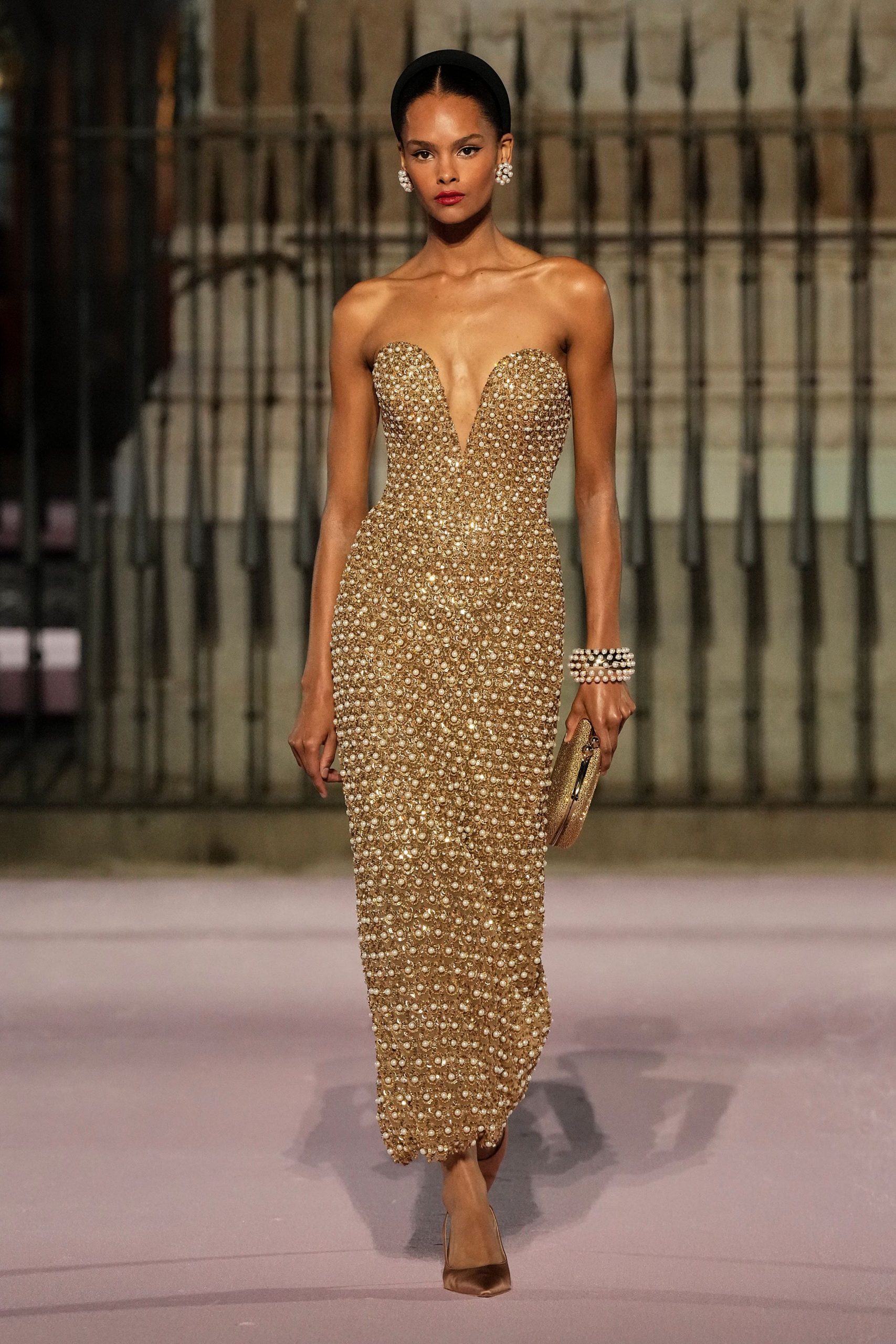 gold beaded strapless gown